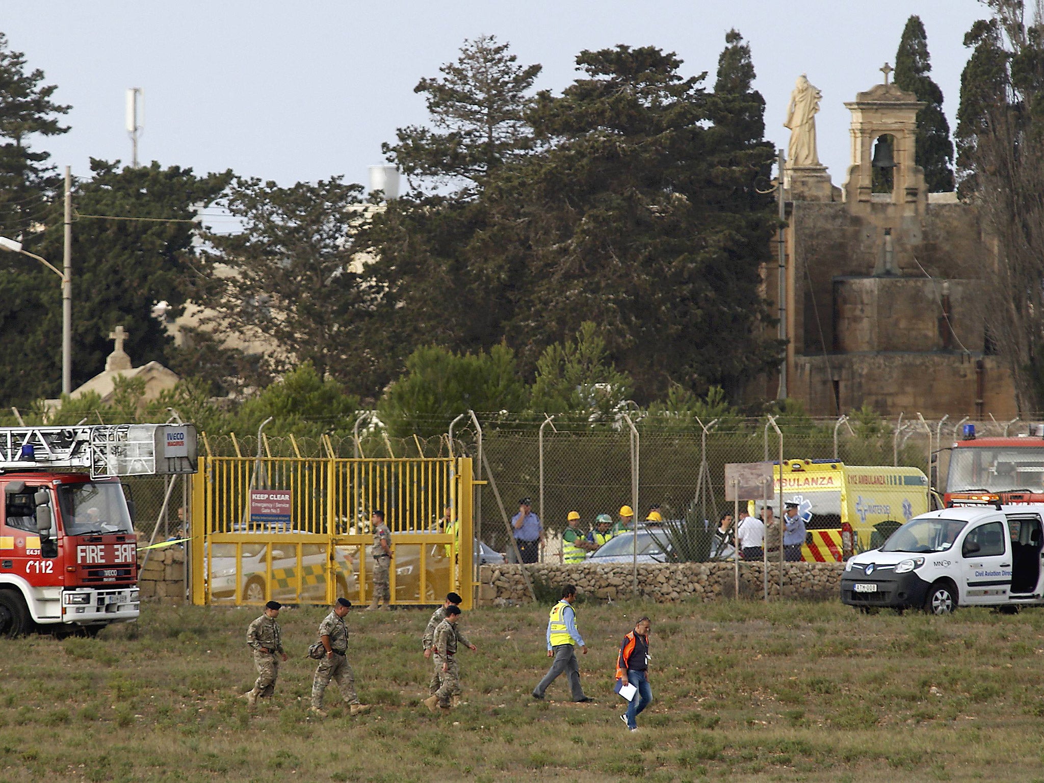 Rescue services at the scene of a light aircraft crash at Malta airport