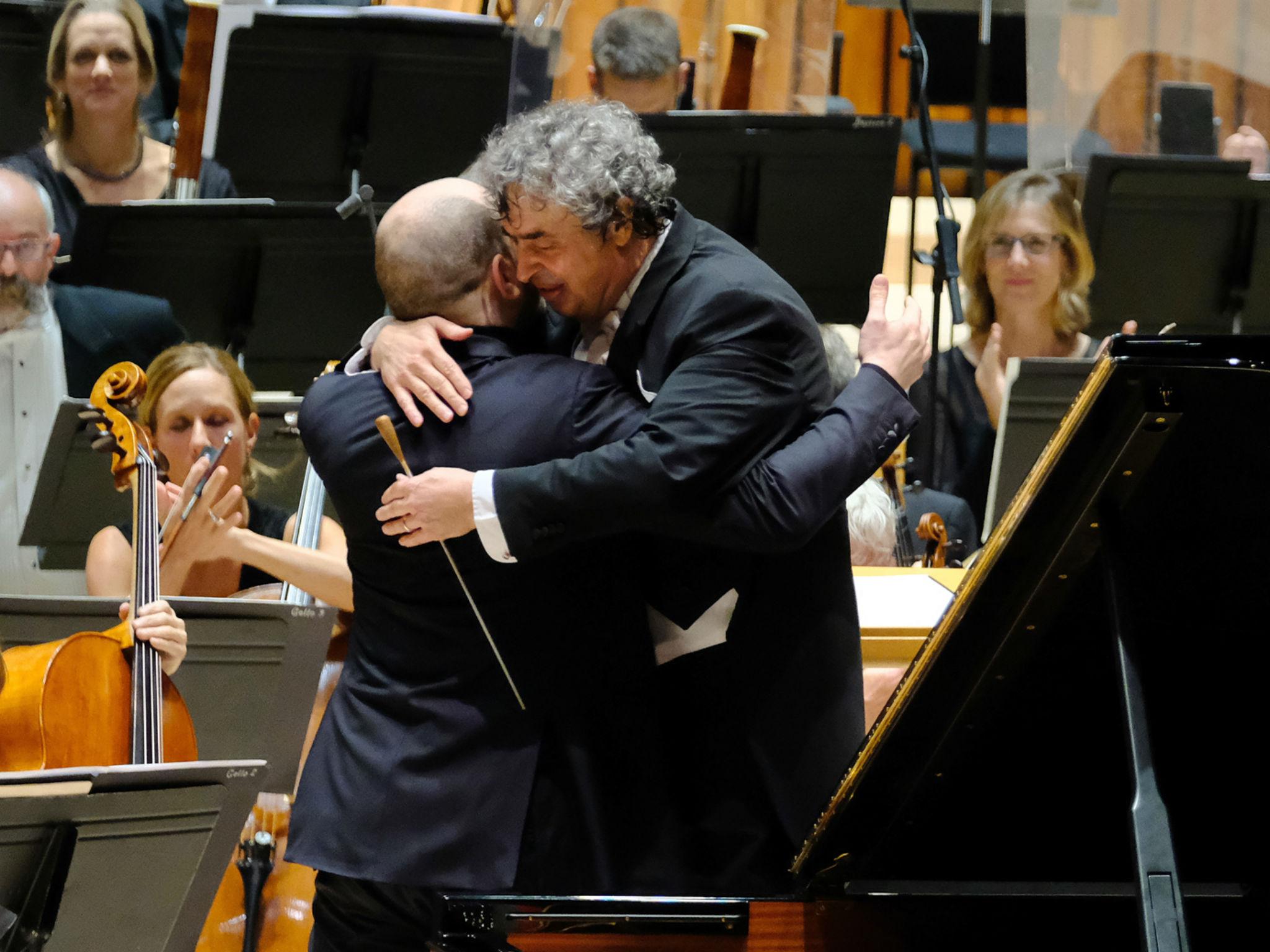 The conductor Semyon Bychkov hugs pianist Kirilli Gerstein at the Barbican (BBC/Ellis O’Brien)