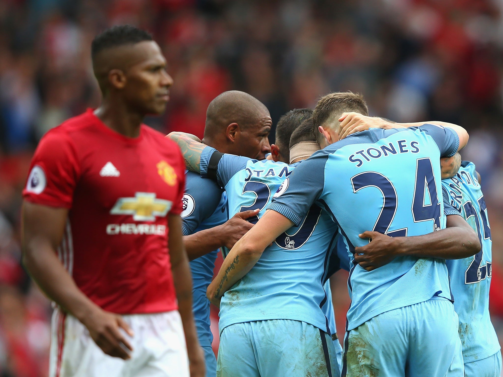 City celebrate their Premier League win at Old Trafford earlier this season