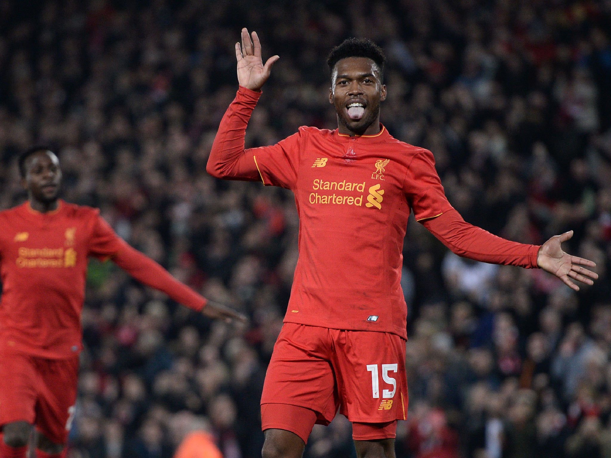 Sturridge celebrates his second strike against Tottenham