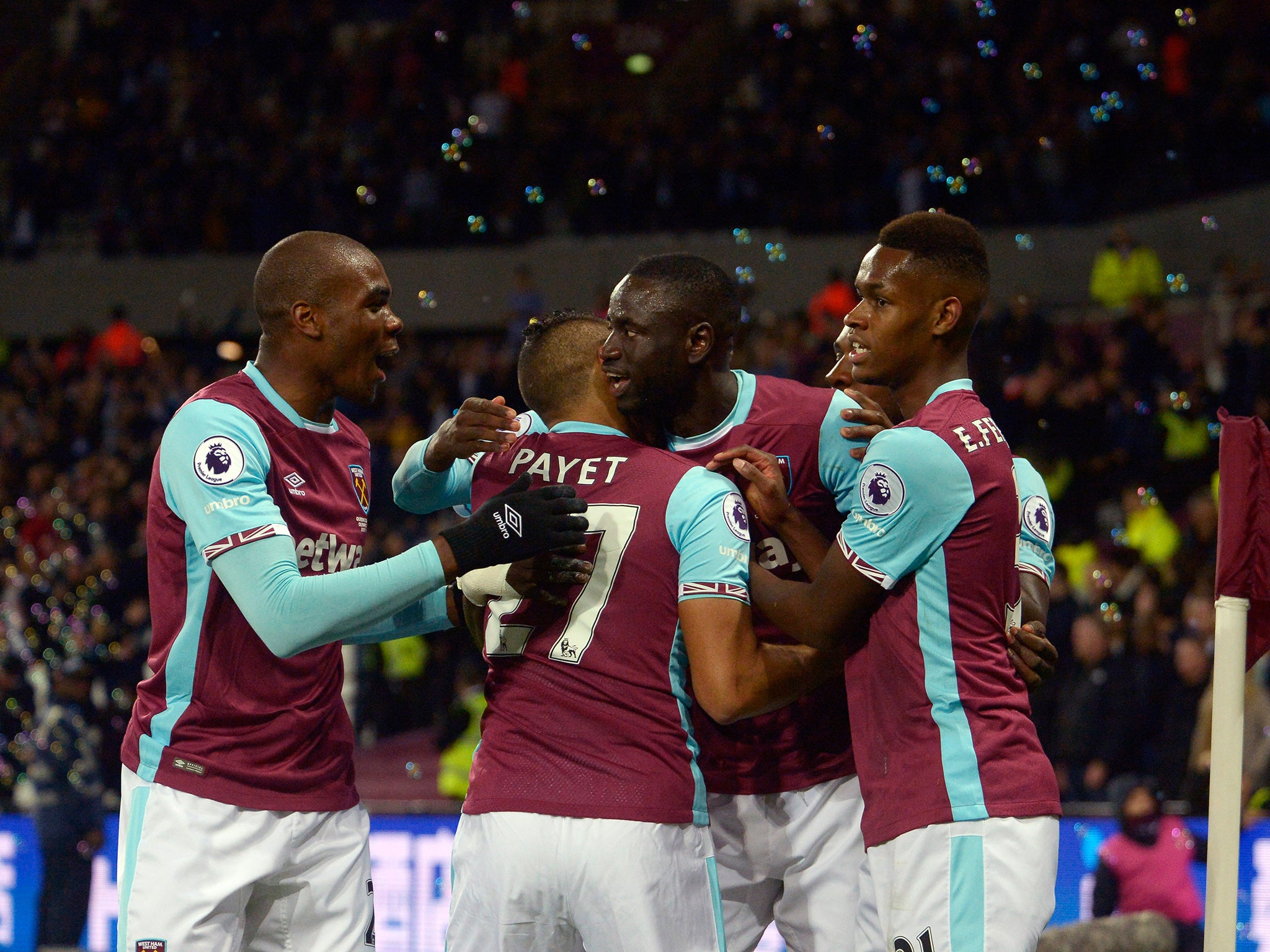 Kouyate celebrates his opening goal for the hosts