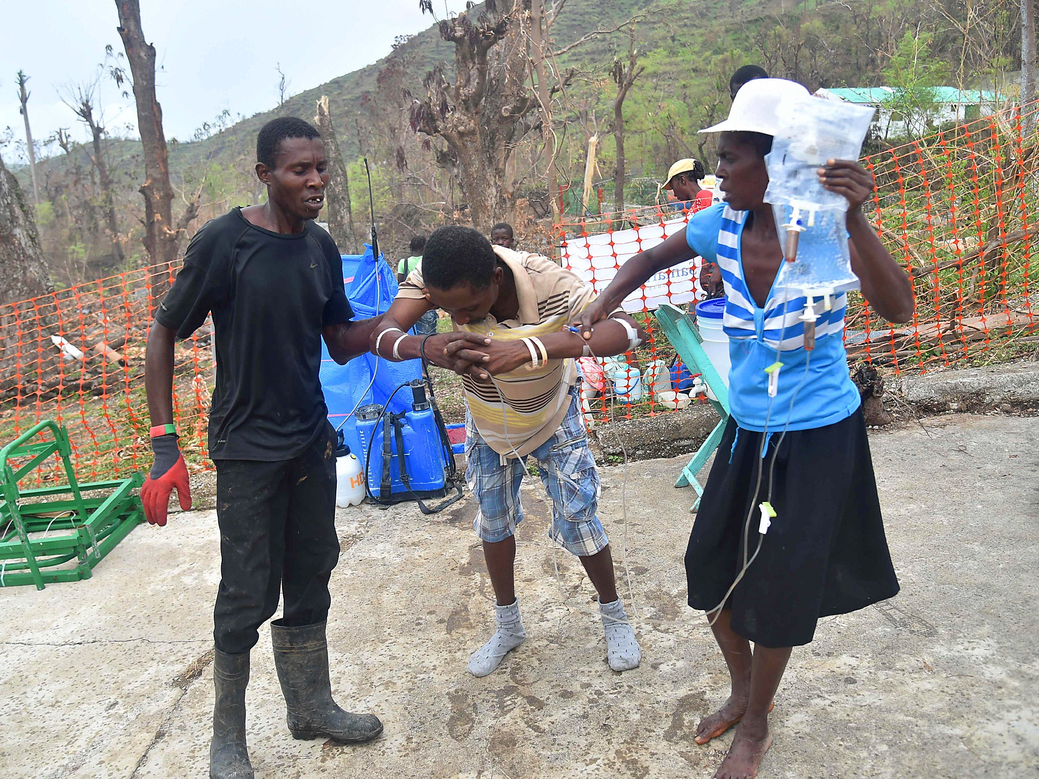 A patient with cholera symptoms arrives in a hospital to receive medical attention in Haiti last week