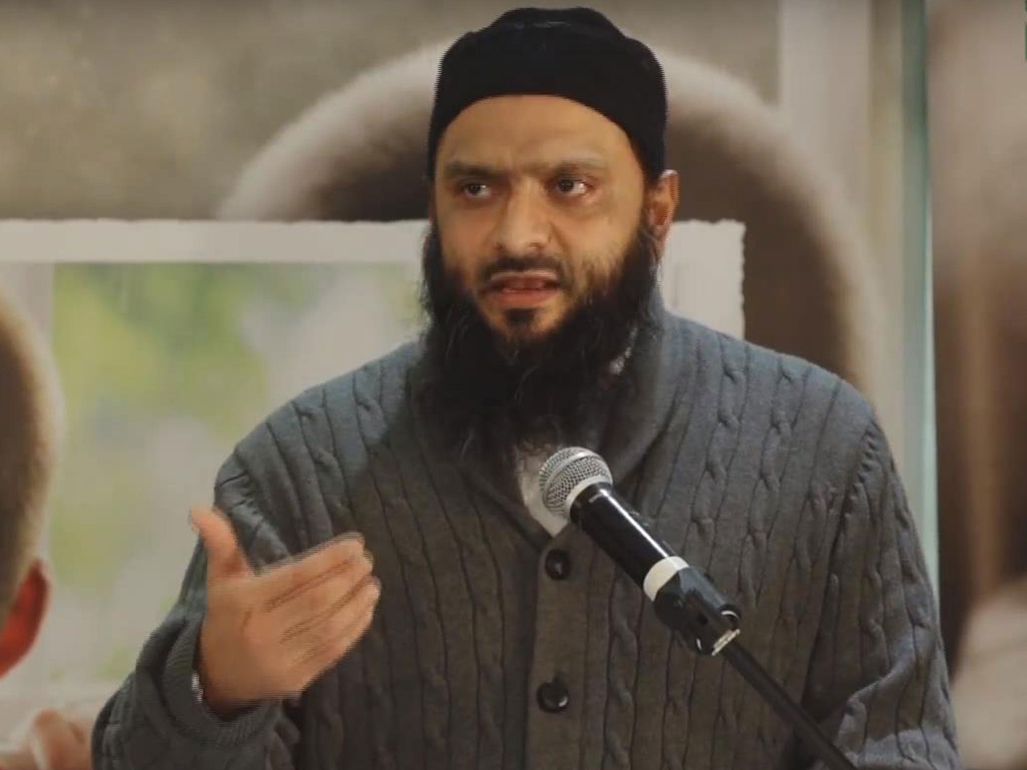 Shakeel Begg giving a speech in 2015