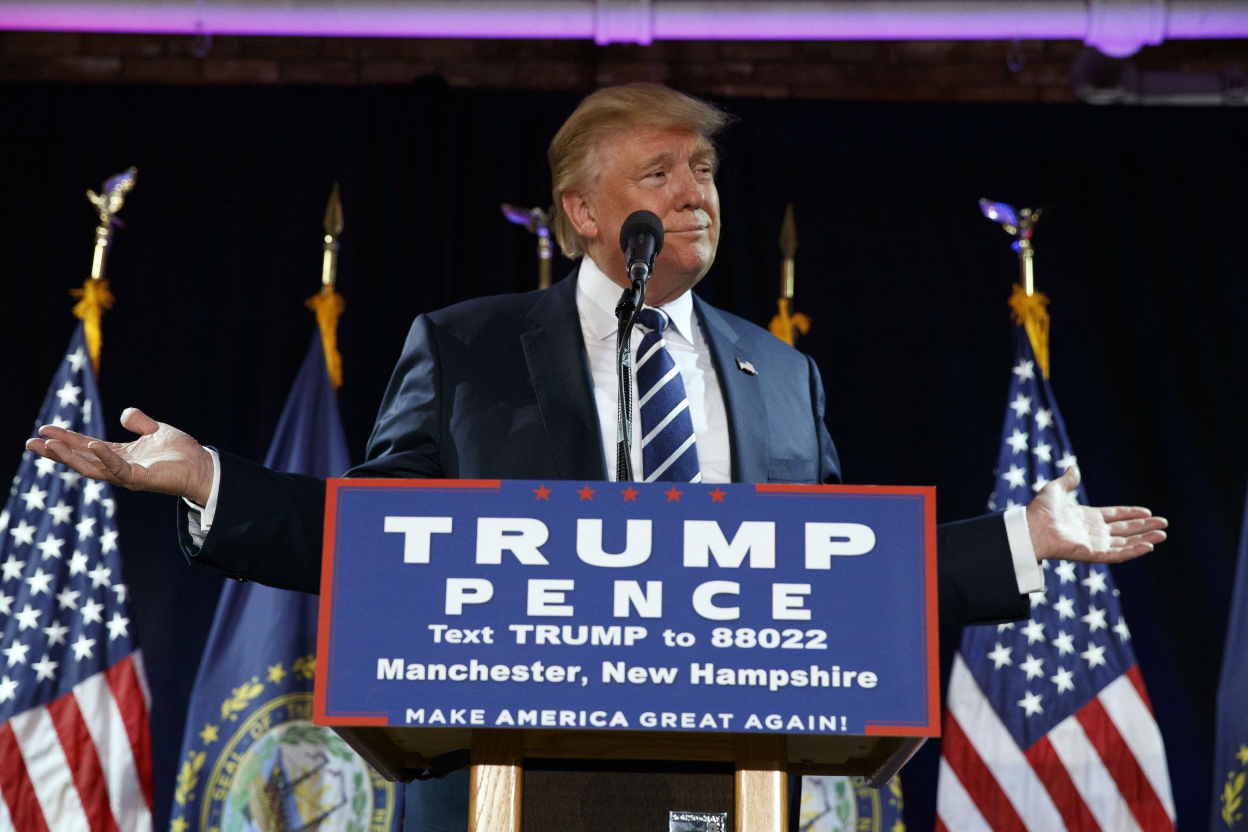 Trump reacting with glee to the FBI announcement at a rally Friday in New Hampshire