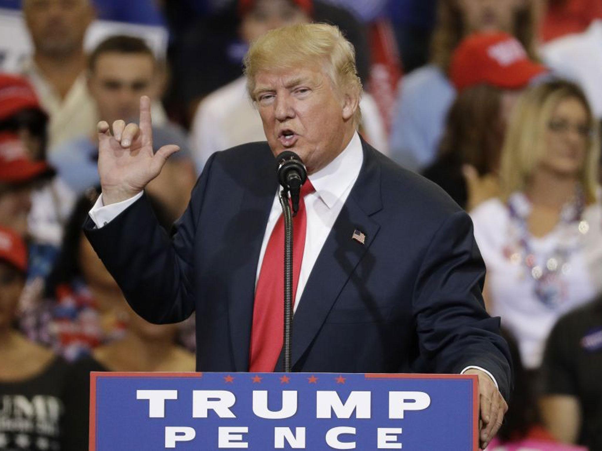 Republican presidential candidate Donald Trump speaks at a rally in Phoenix