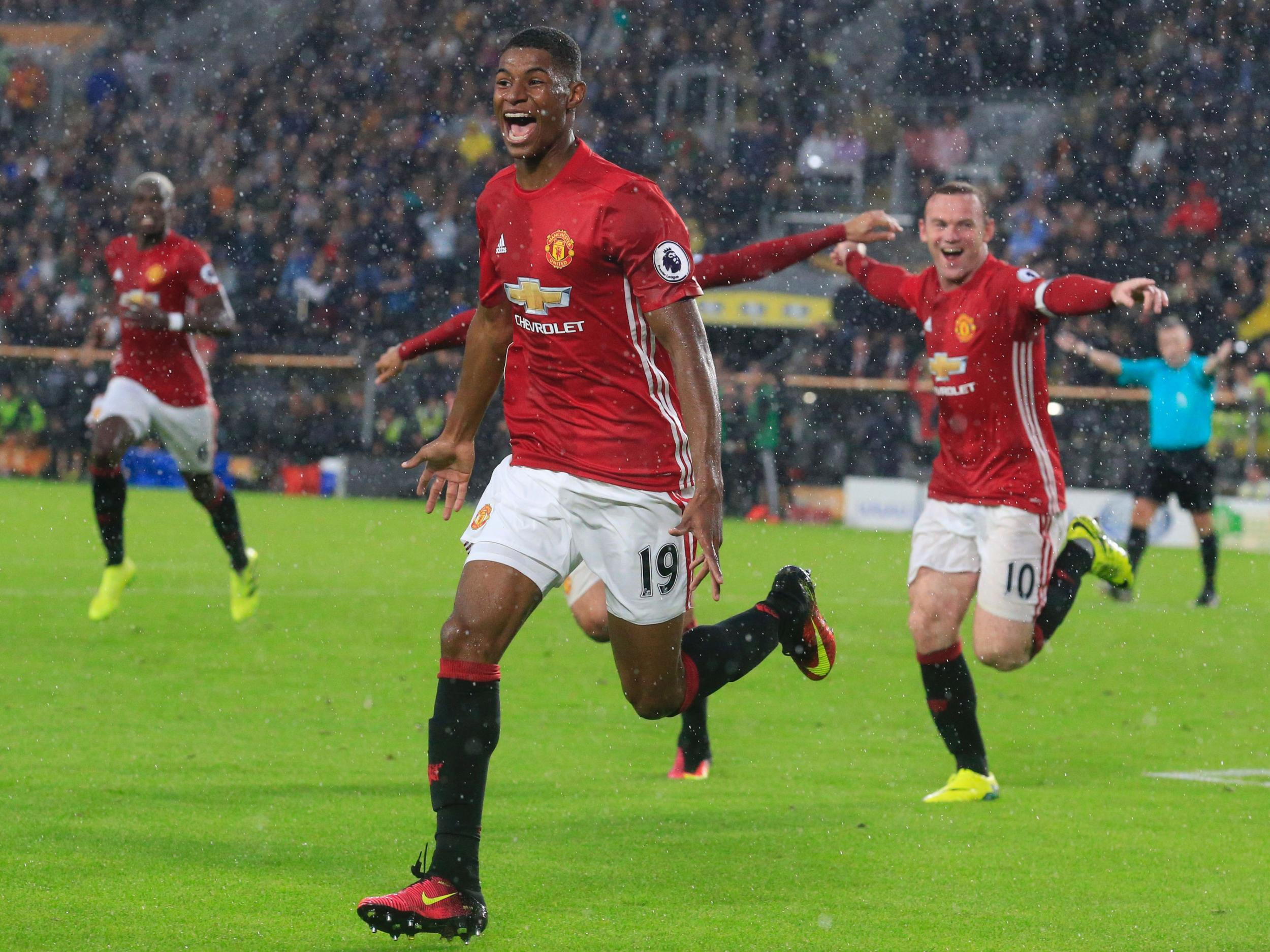 &#13;
Neville takes delight in seeing Rashford and Lingard in the United team (AFP/Getty)&#13;