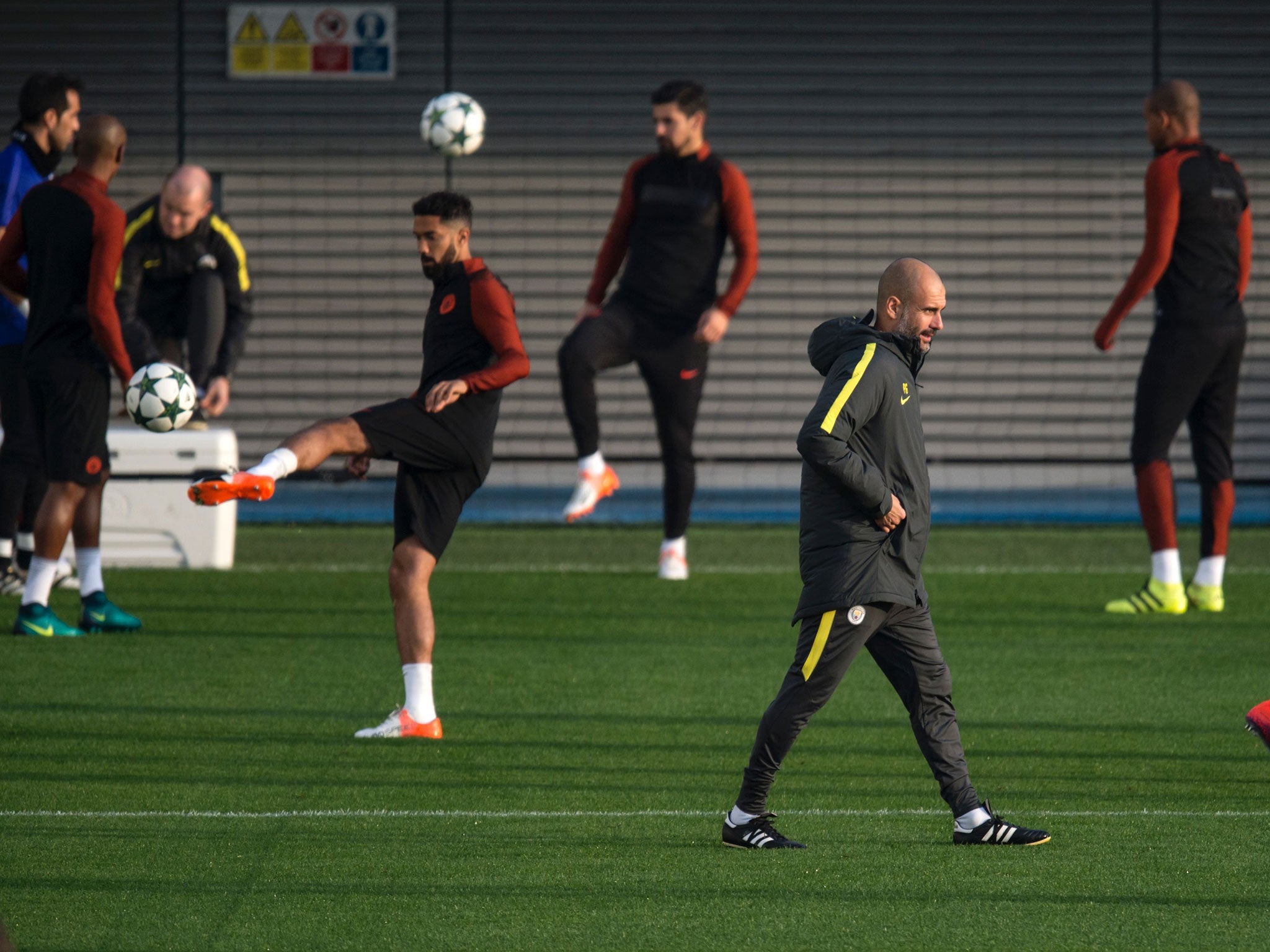 Pep Guardiola oversees City training ahead of the Barcelona match