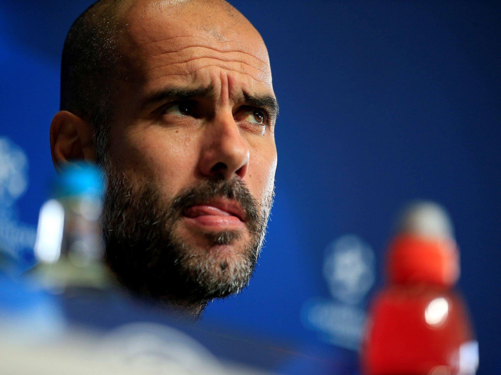Pep Guardiola looks perplexed ahead of City v Barcelona