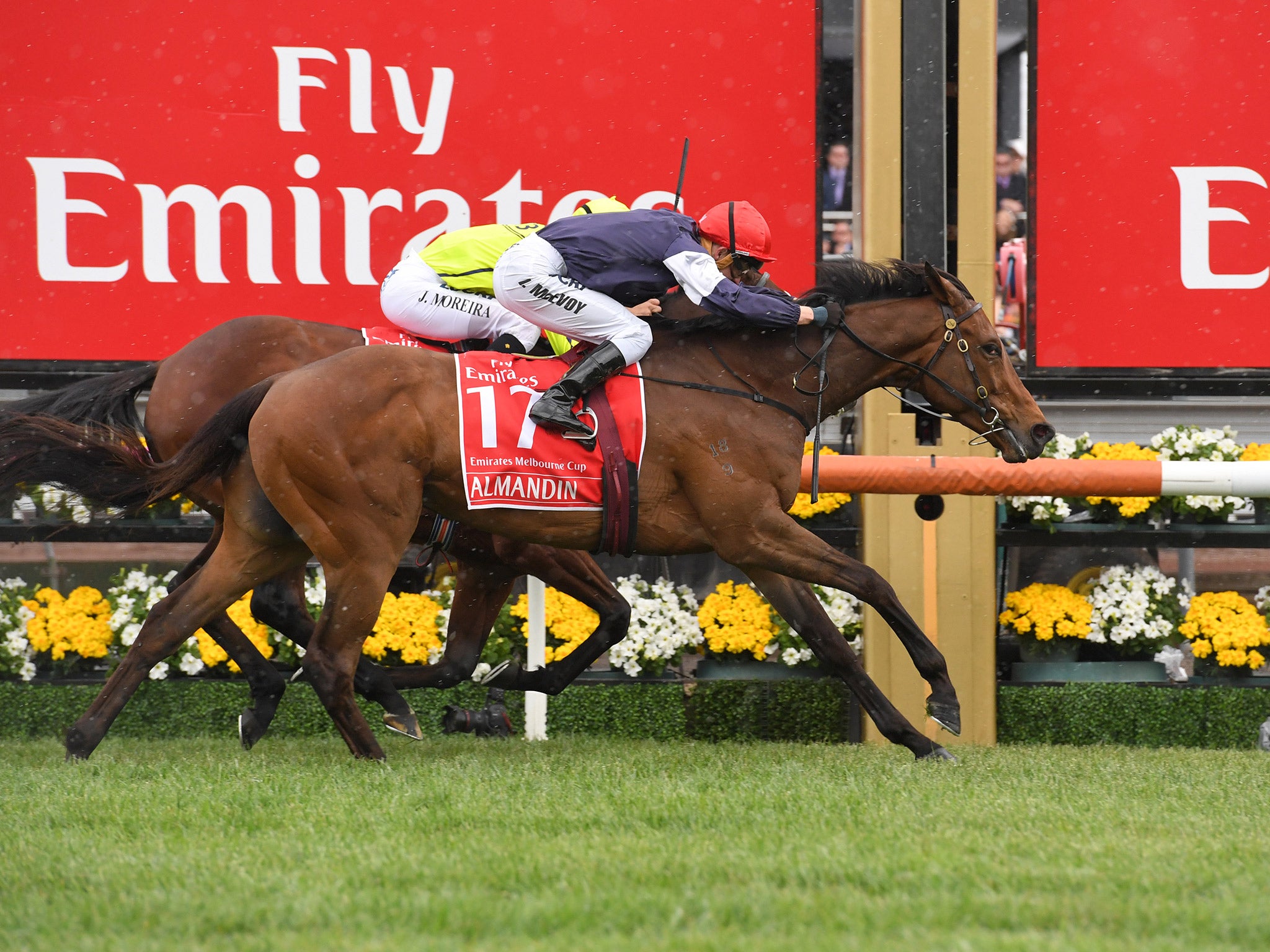 Almandin crosses the line to win the Melbourne Cup just ahead of Heartbreak City