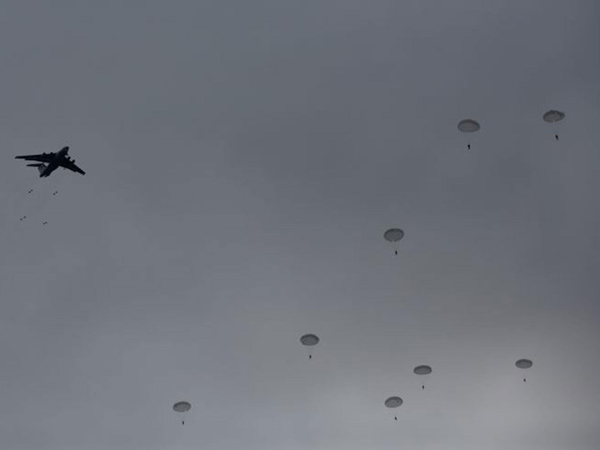 Russian and Serbian soldiers parachute from a plane during the Russian-Serbian joint anti terrorist exercise Srem 2014, at Nikinci training ground, 60 kilometers west of Belgrade, Serbia 14 November, 2014