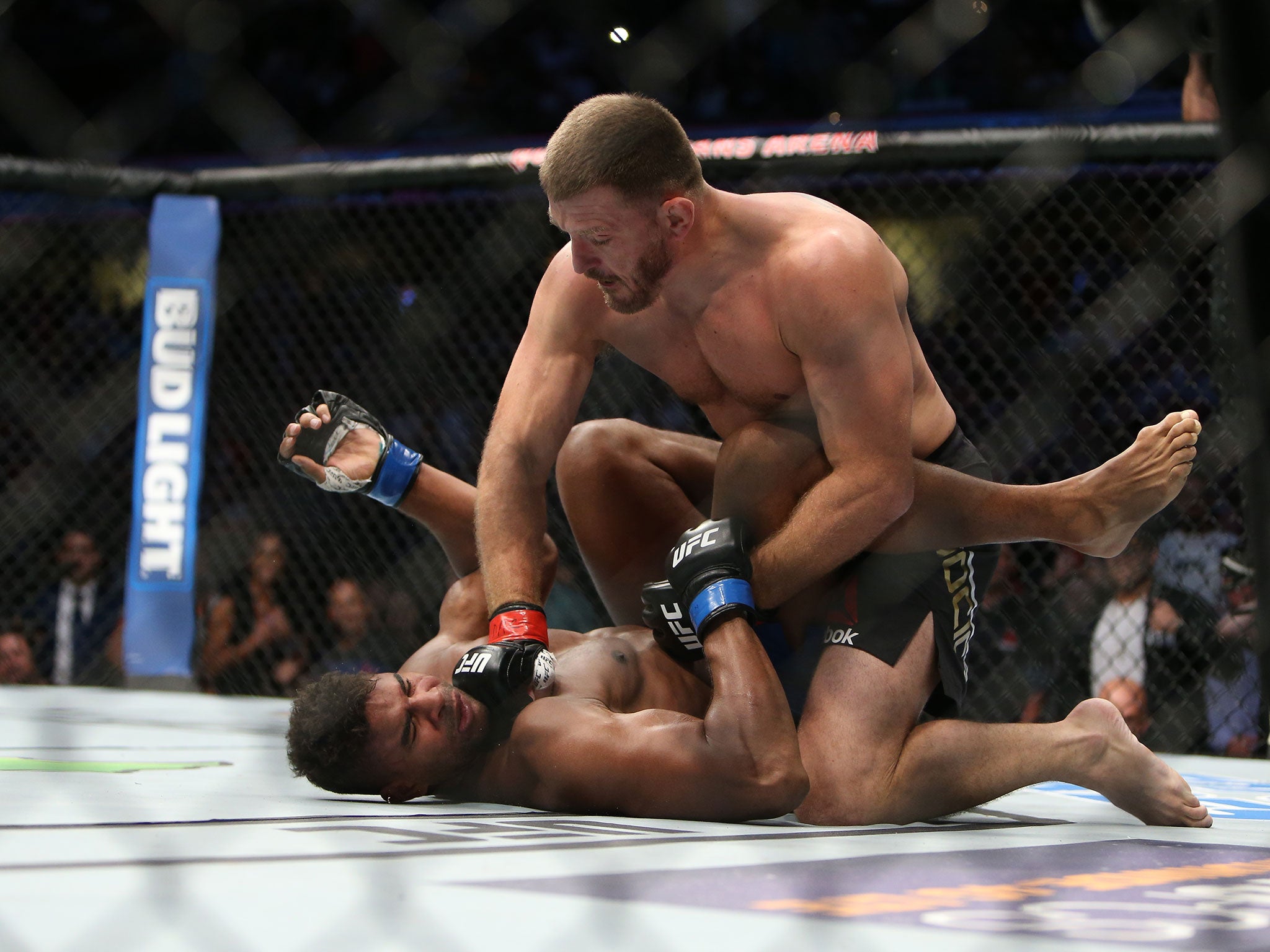 Stipe Miocic in action against Alistair Overeem at UFC 203