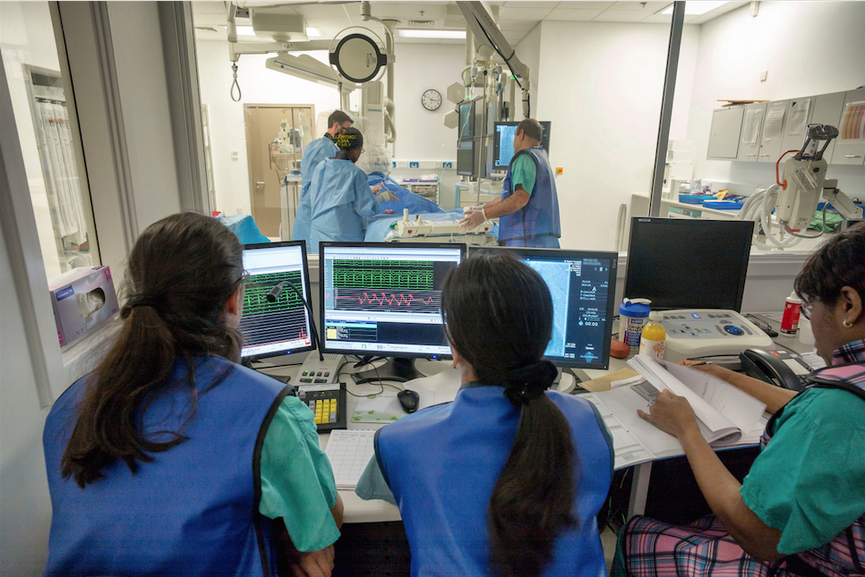 The heart attack response team At Barts Heart Centre working hard to unblock a patients coronary artery