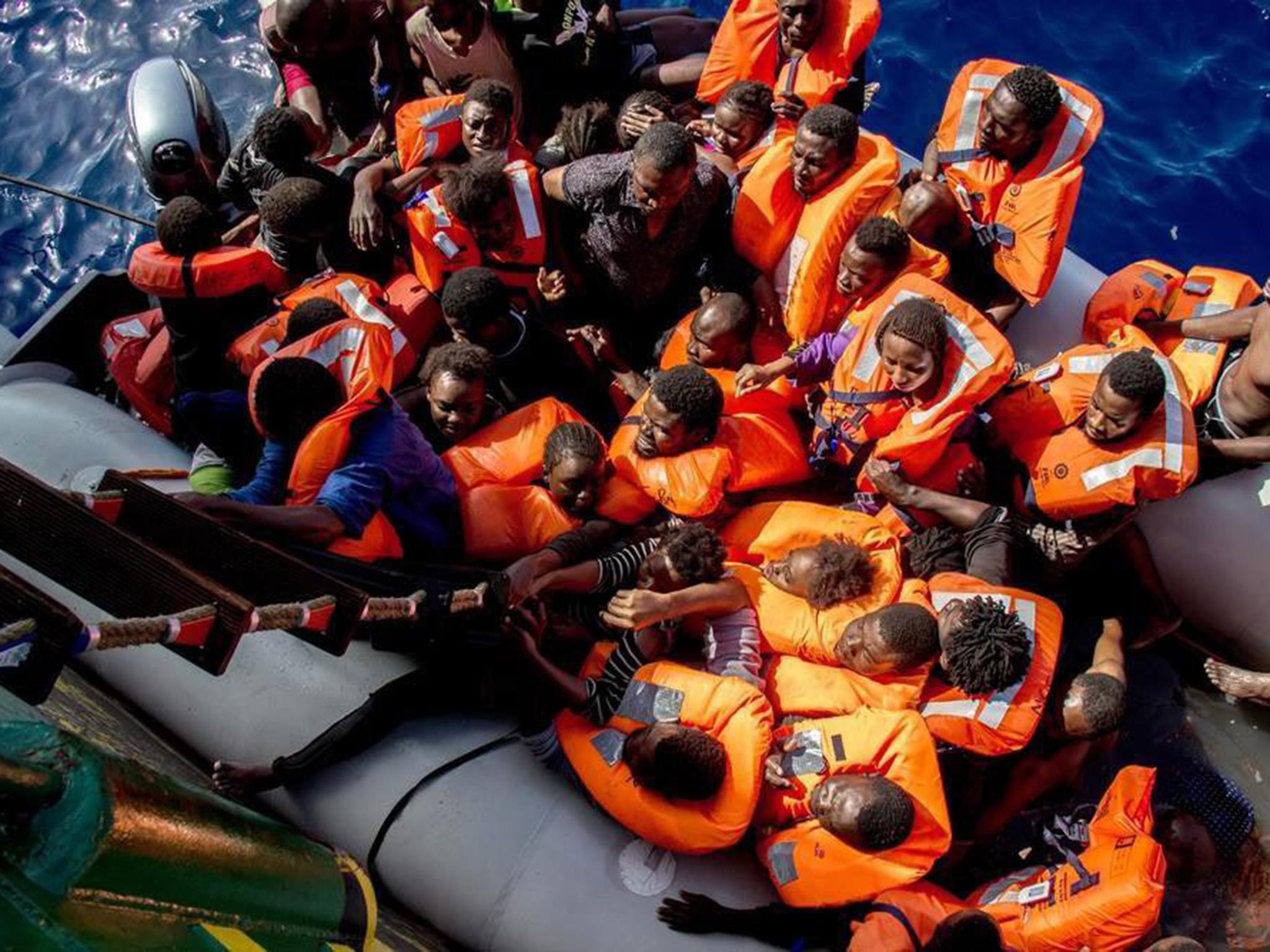 Medecins Sans Frontieres shows people board the Bourbon Argos during a rescue operation in the Mediterranean Sea