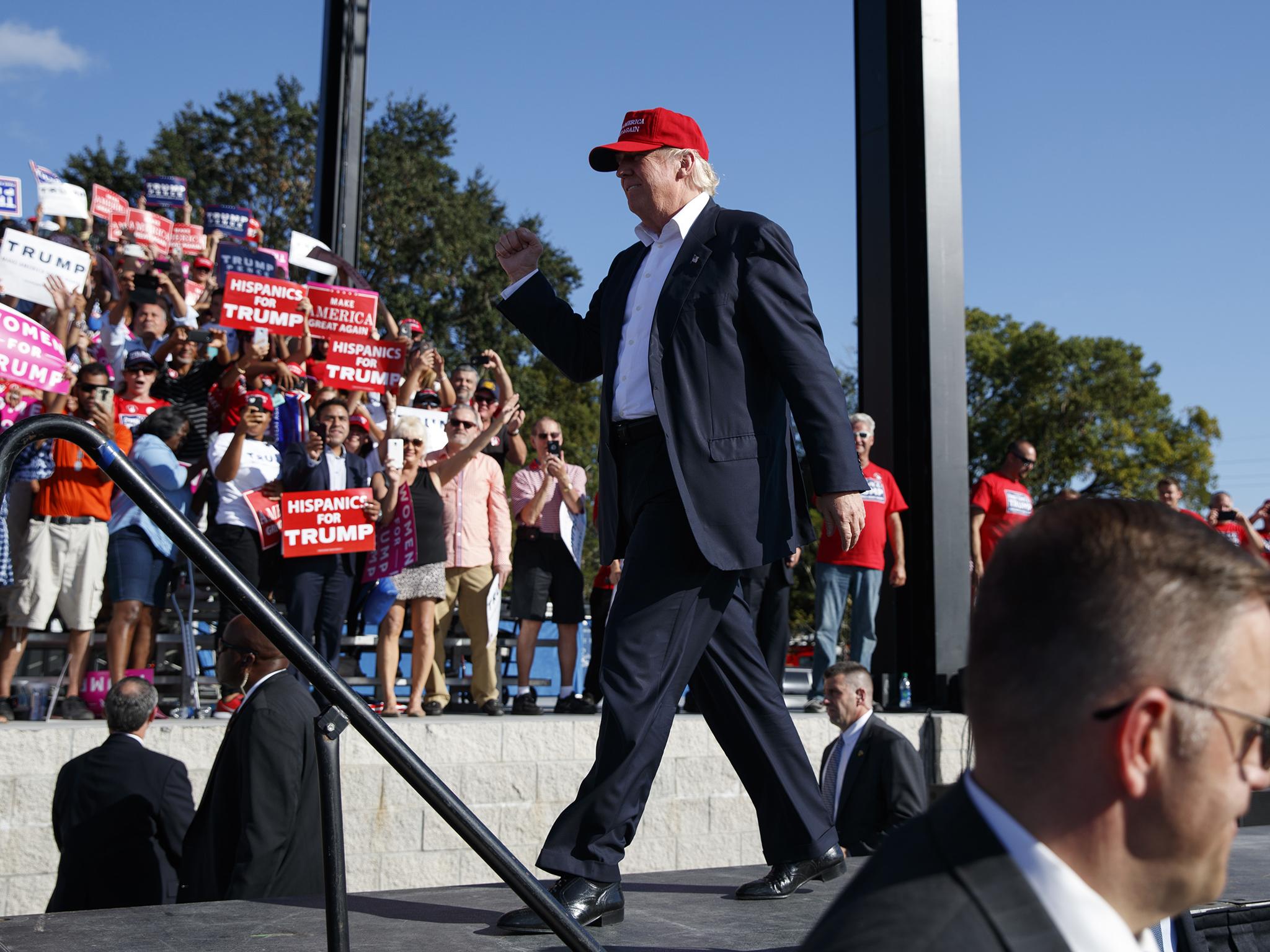 Despite his campaign gaining momentum, Trump told supporters at a campaign rally in Florida 'don’t believe it' AP