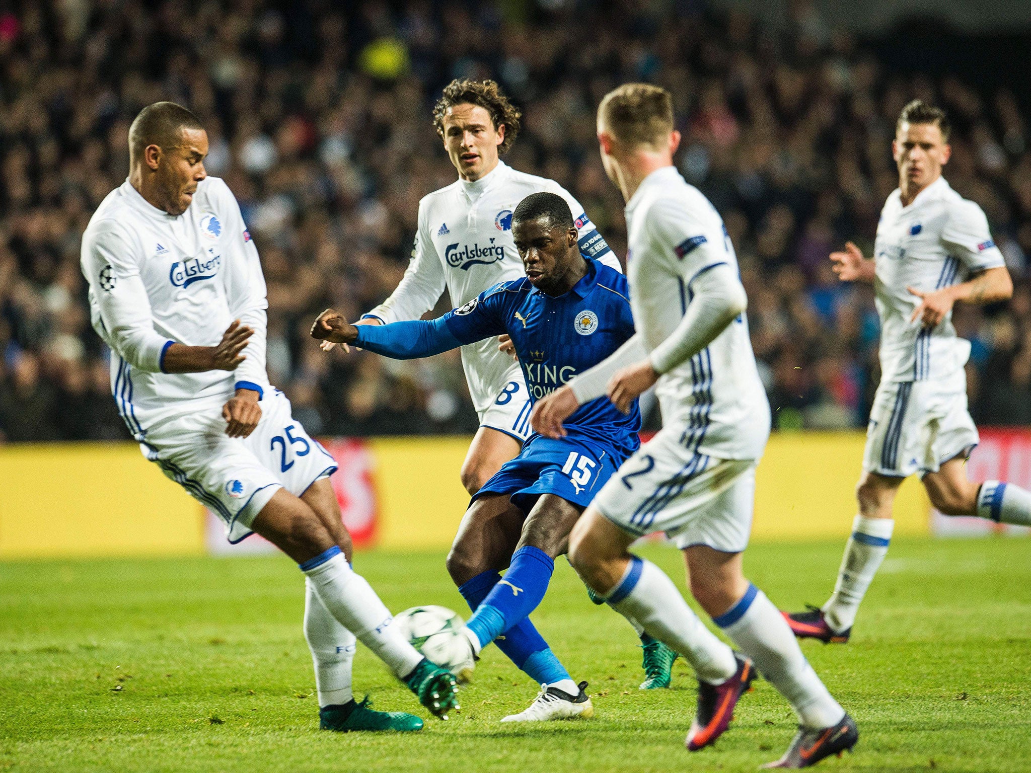 Jeff Schlupp attempts to get a shot off on goal after being swamped by Copenhagen players