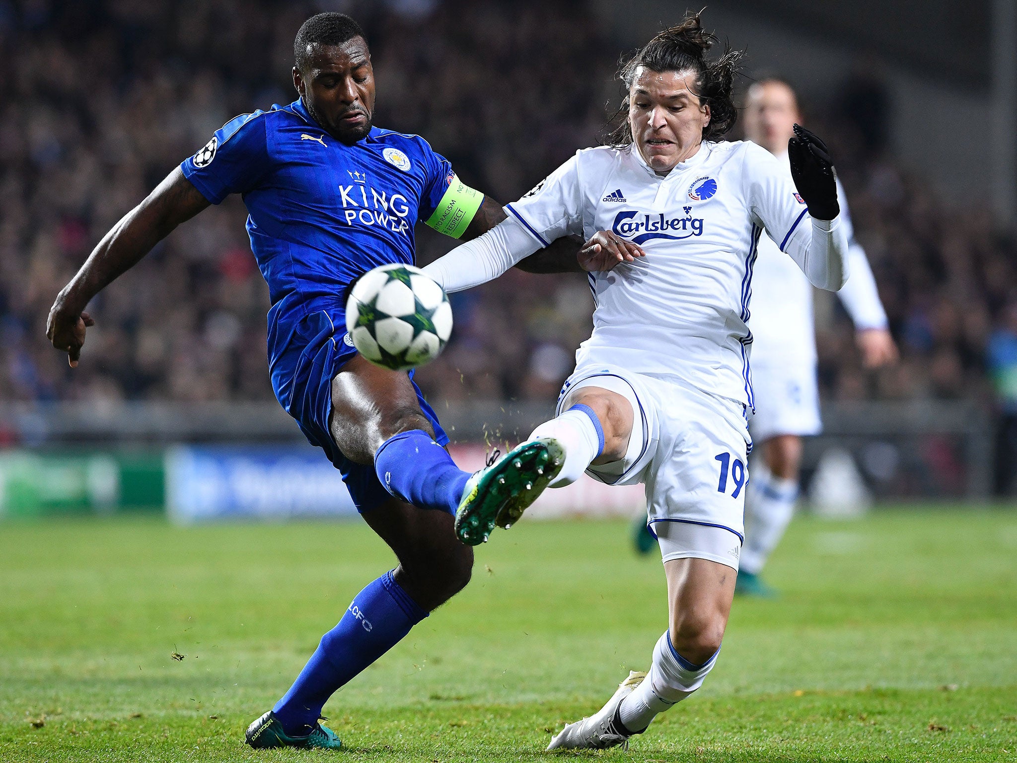 Wes Morgan clashes with FC Copenhagen's Paraguayan forward Federico Santander