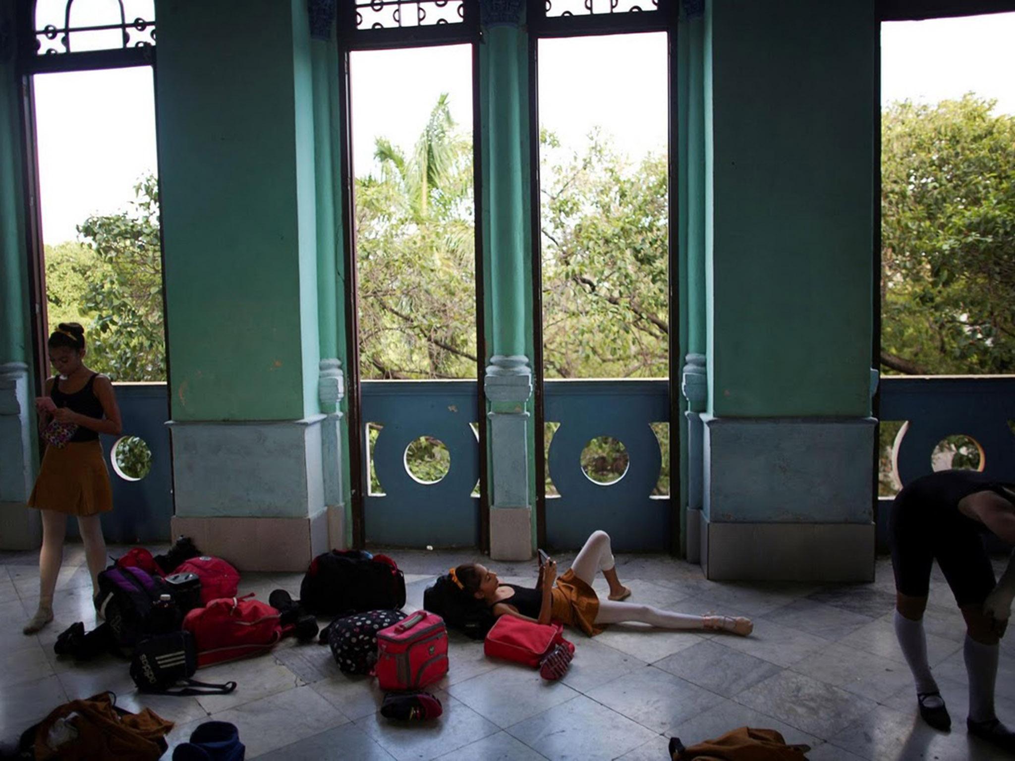 Students at the Cuba's National Ballet School (ENB) relax during a break in Havana, Cuba