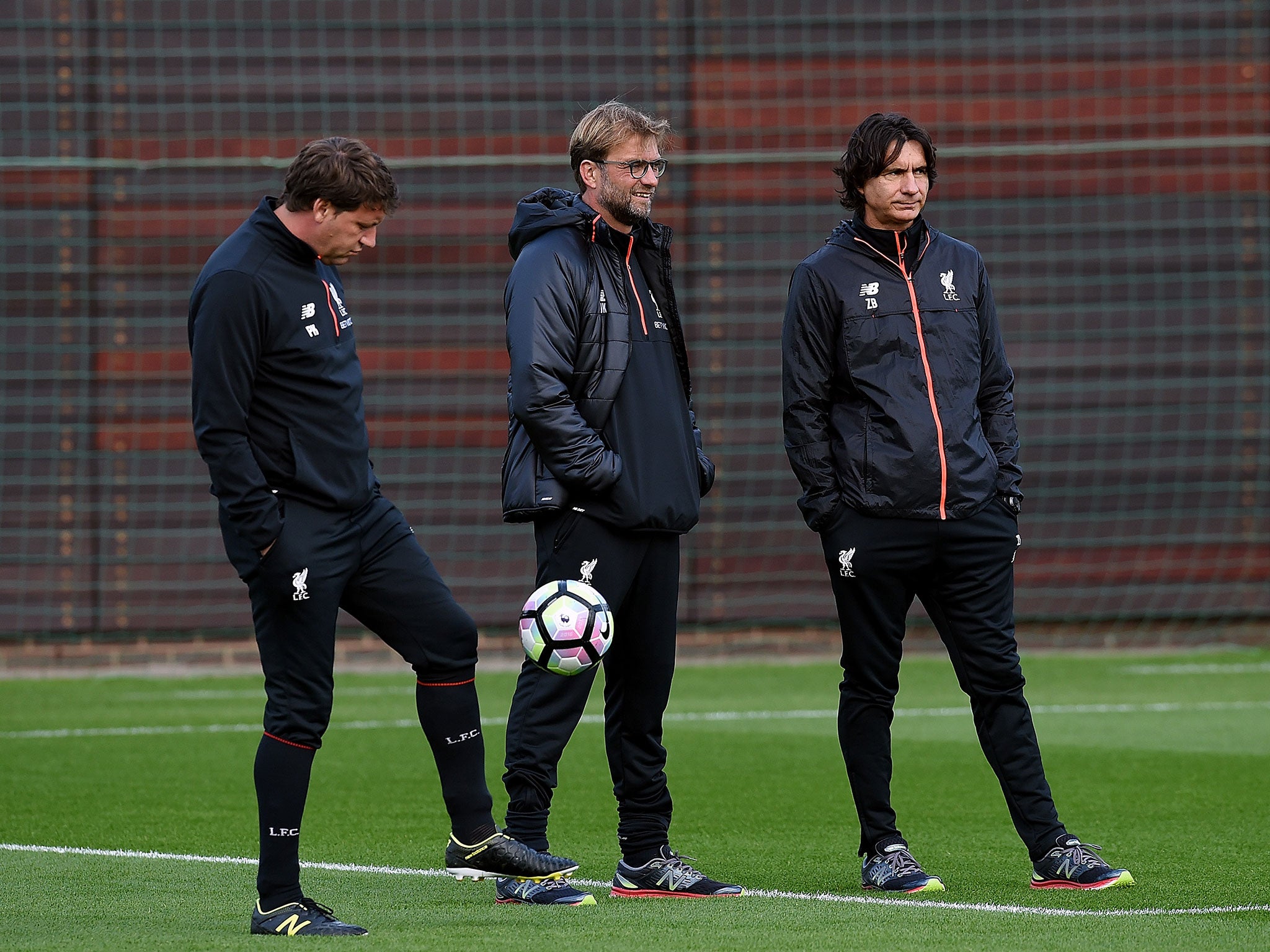 &#13;
Klopp with his coaching staff at Melwood Training Ground, where the German installed privacy screens &#13;