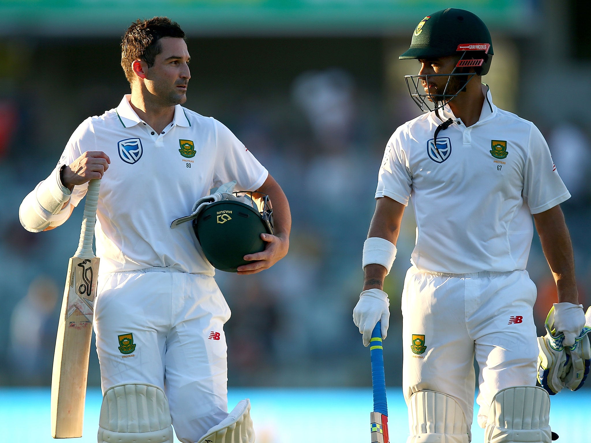 Dean Elgar and Jean-Paul Duminy walk from the field at stumps following a remarkable South African fightback