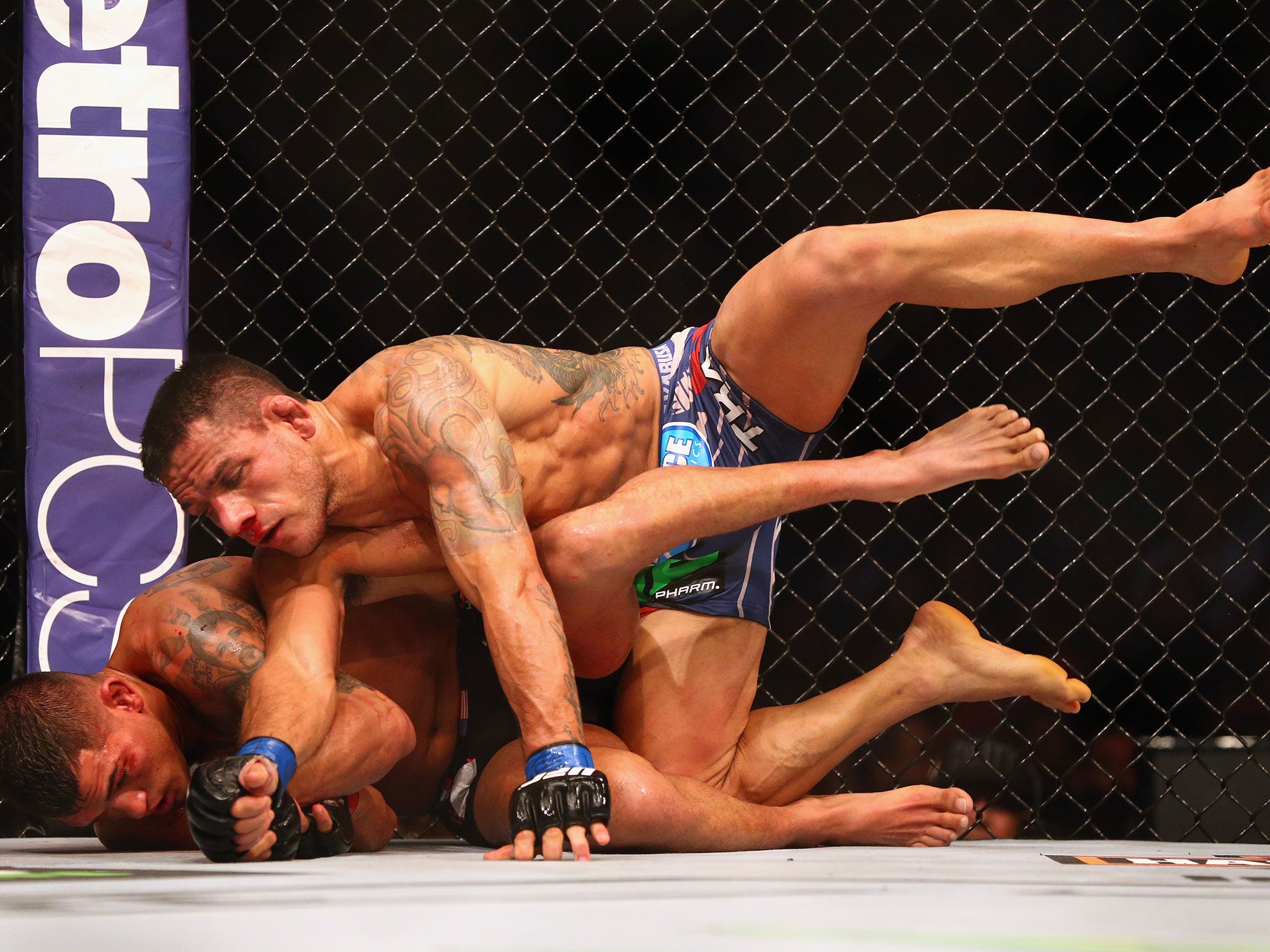 Rafael dos Anjos in action against Anthony Pettis