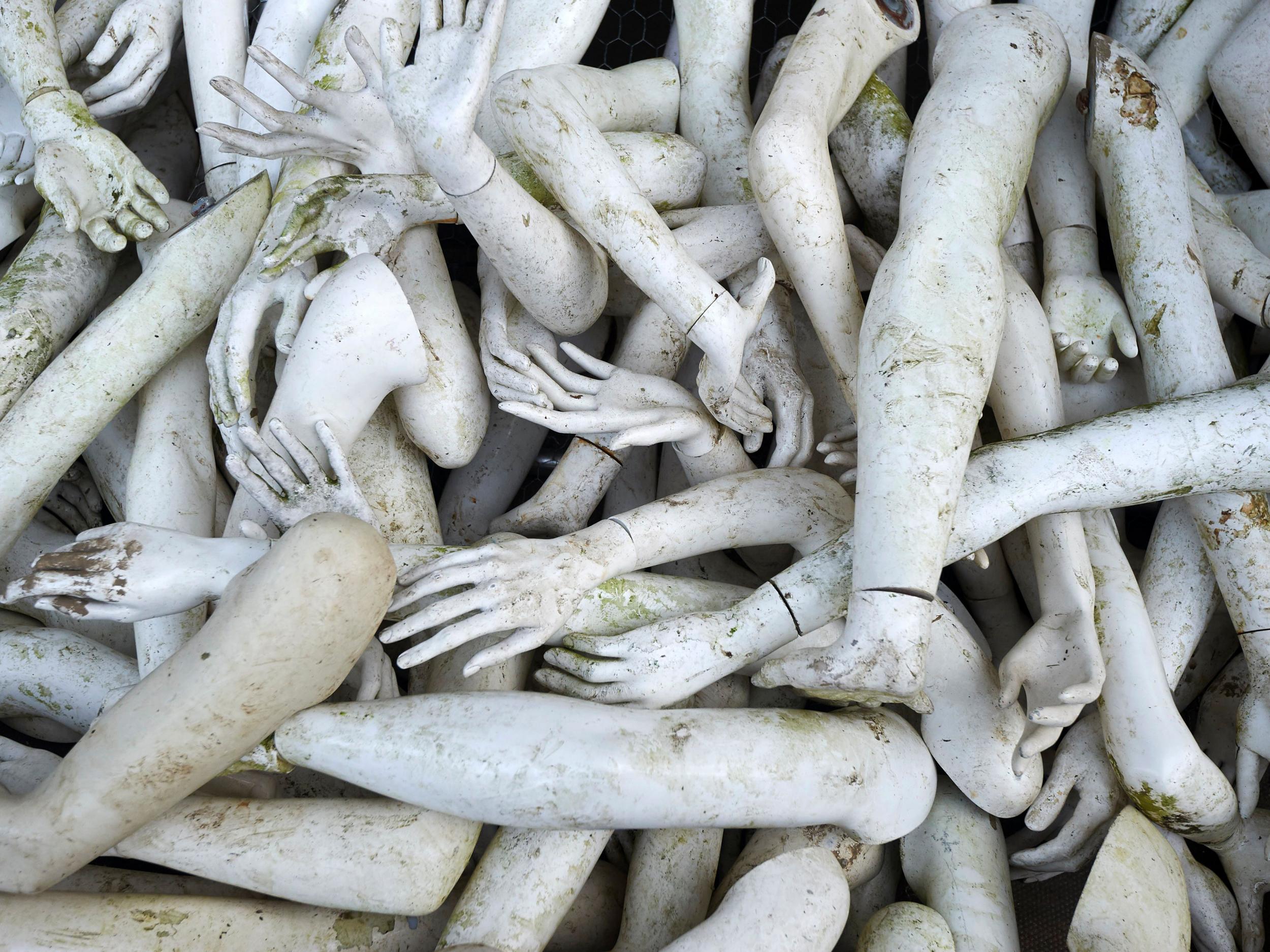 A structure made from white mannequin limbs is pictured outside the Russian Embassy