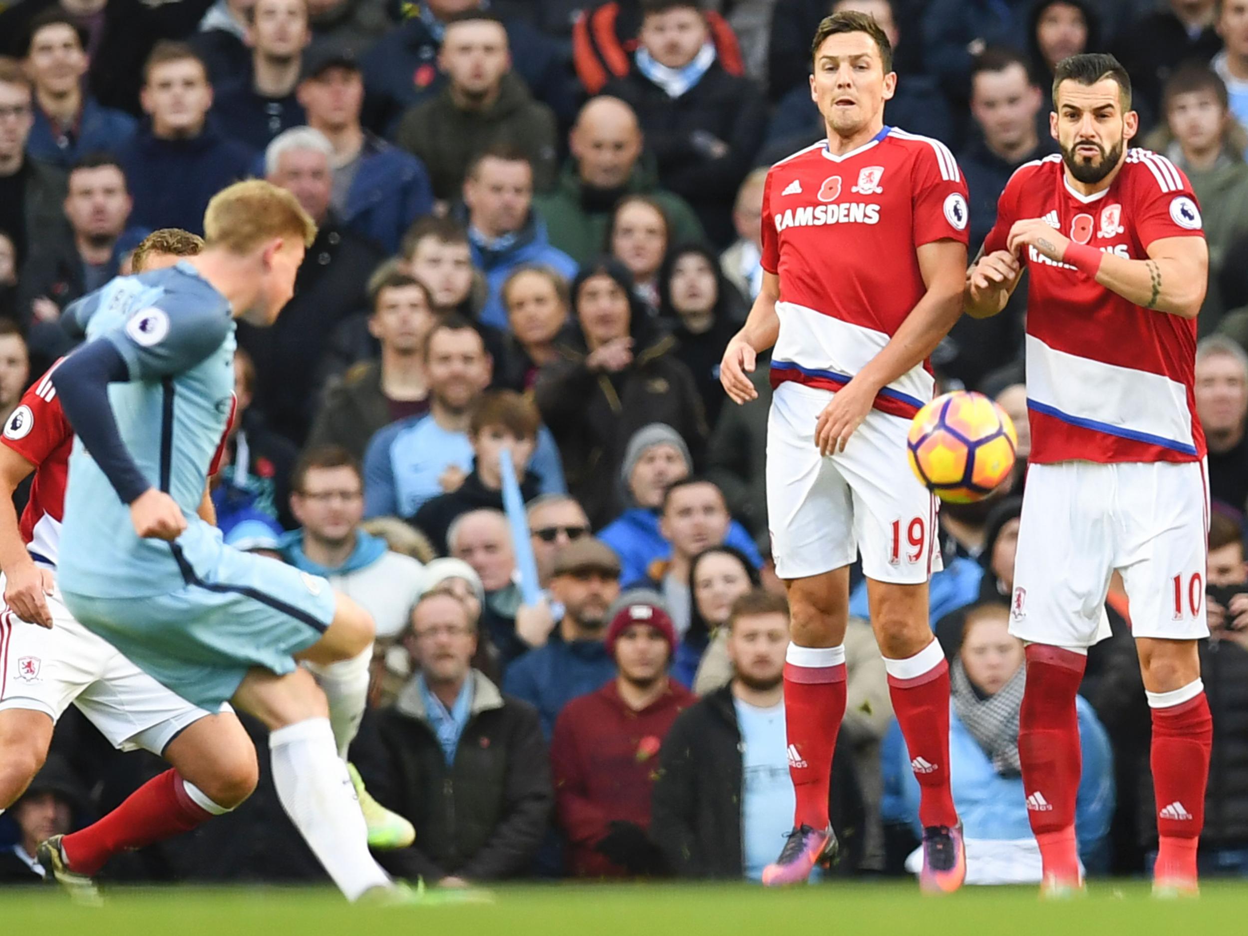 De Bruyne tries his luck from a free kick