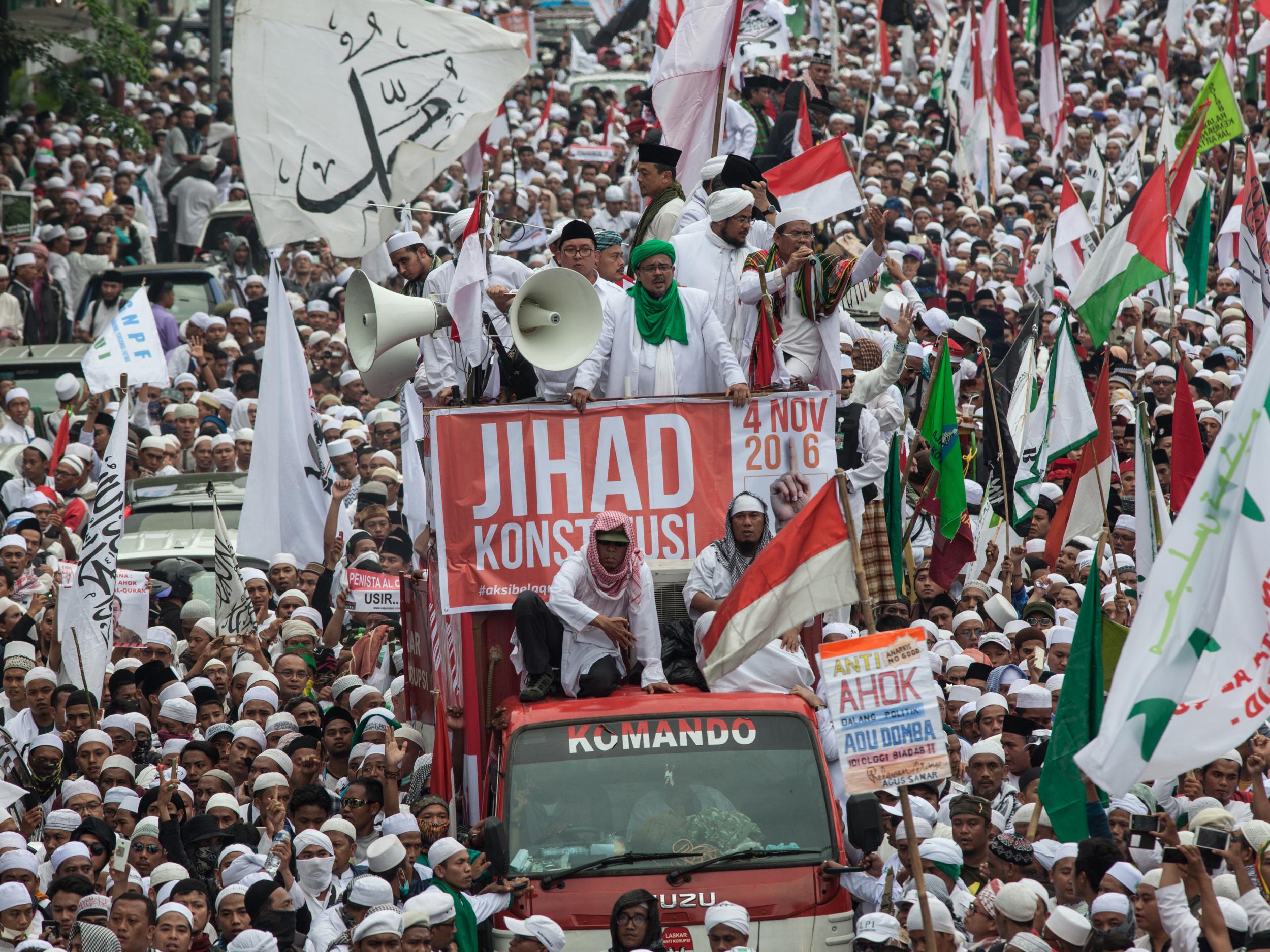 Protesters march to the Merdeka Palace (Getty Images )