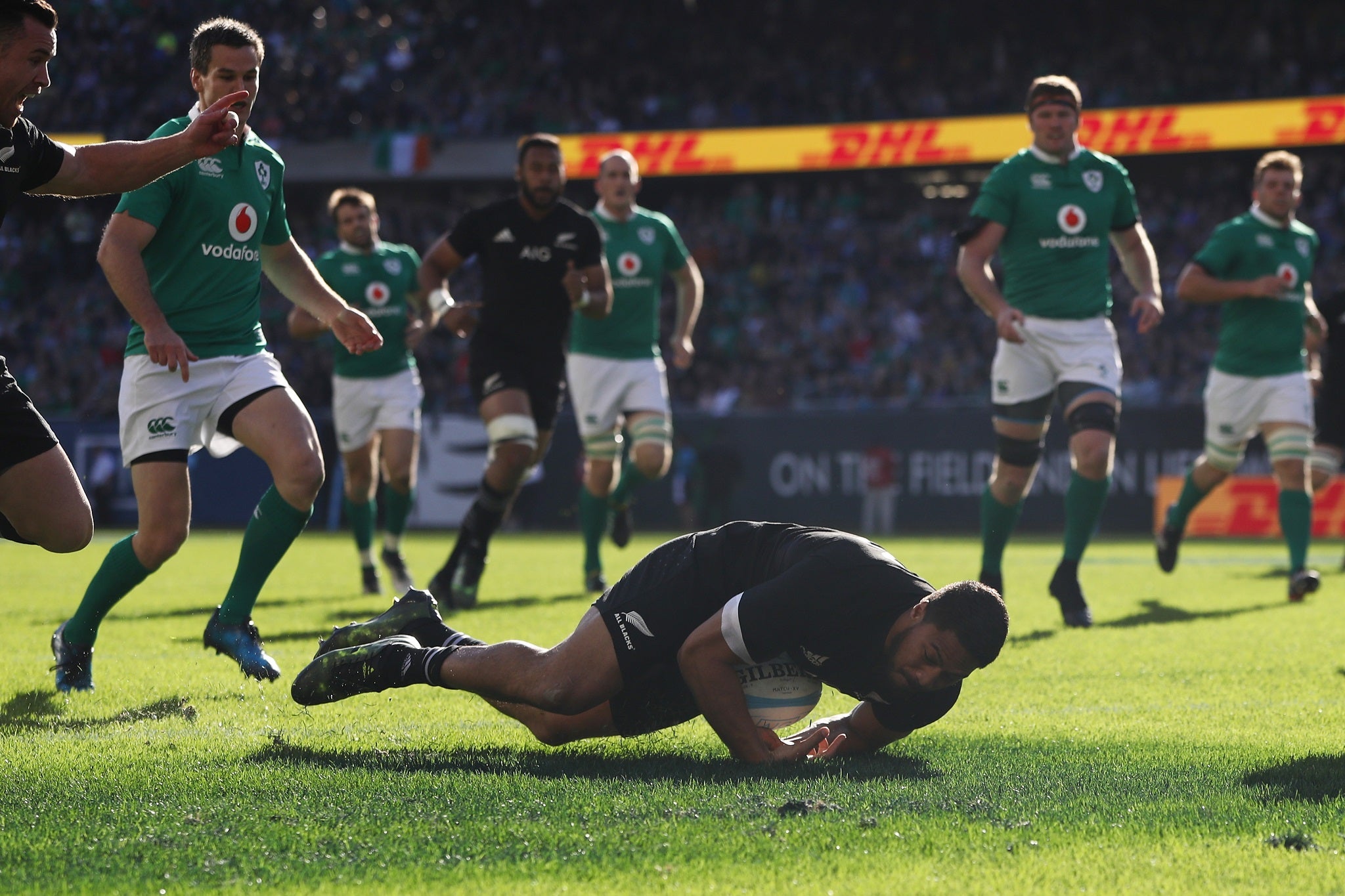 George Moala dives on the ball to score the first try for New Zealand against Ireland