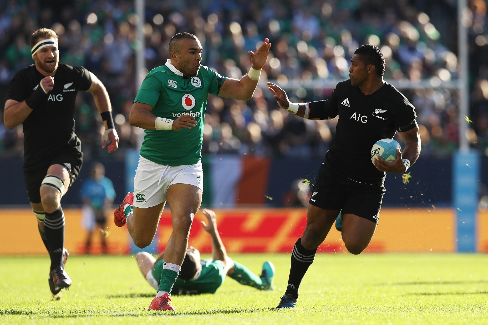 Waisake Naholo tries to fend off Simon Zebo