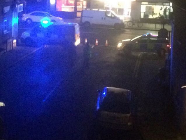 Police vehicles outside HMP Bedford