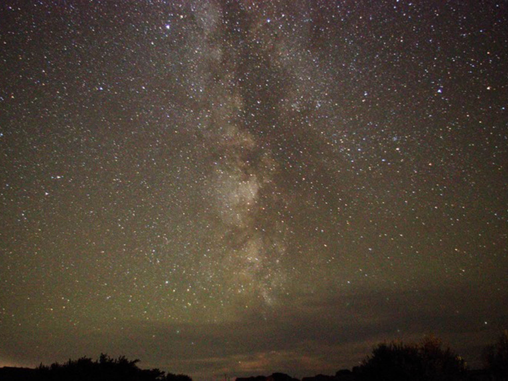 Airglow captured by Michael Darby from Cornwall, UK. The Milky Way shines through in the centre of the image