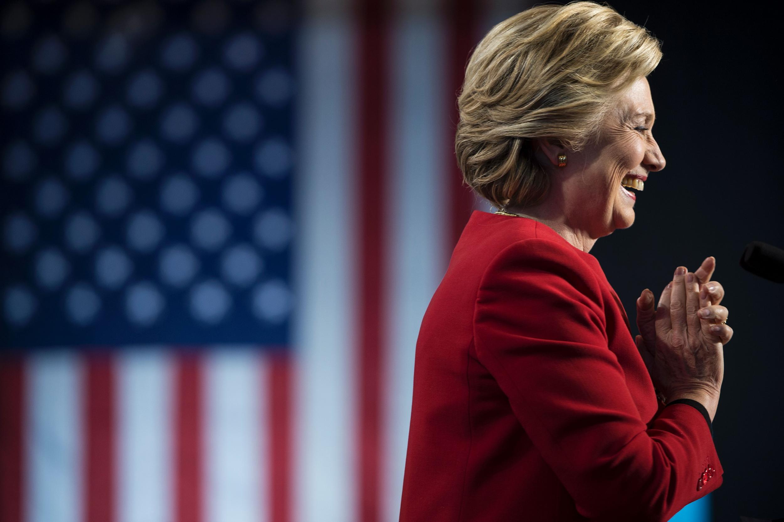 Hillary Clinton arrives for a rally in Michigan