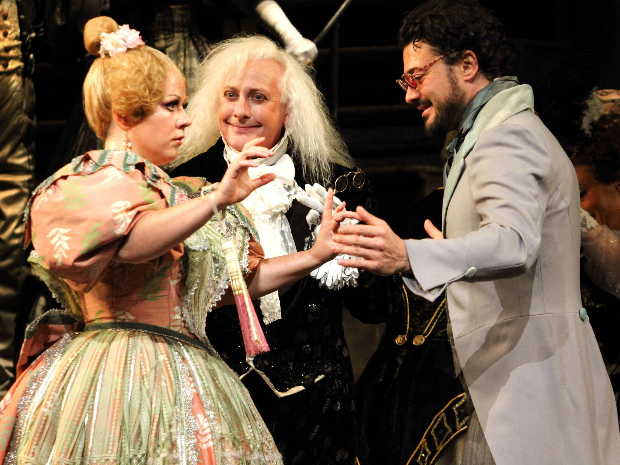 Sofia Fomina as Olympia, Christopher Mortagne as Spalanzani and Vittorio Grigolo as Hoffman in Les Contes d’Hoffmann at the Royal Opera House