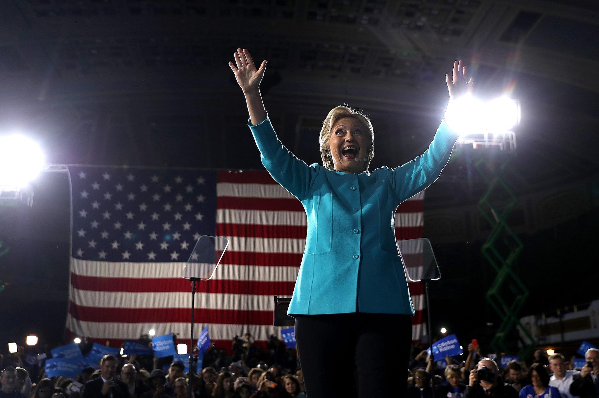 Democratic presidential nominee former Secretary of State Hillary Clinton greets supporters during a campaign rally at the Cleveland Public Auditorium on November 6, 2016 in Cleveland, Ohio