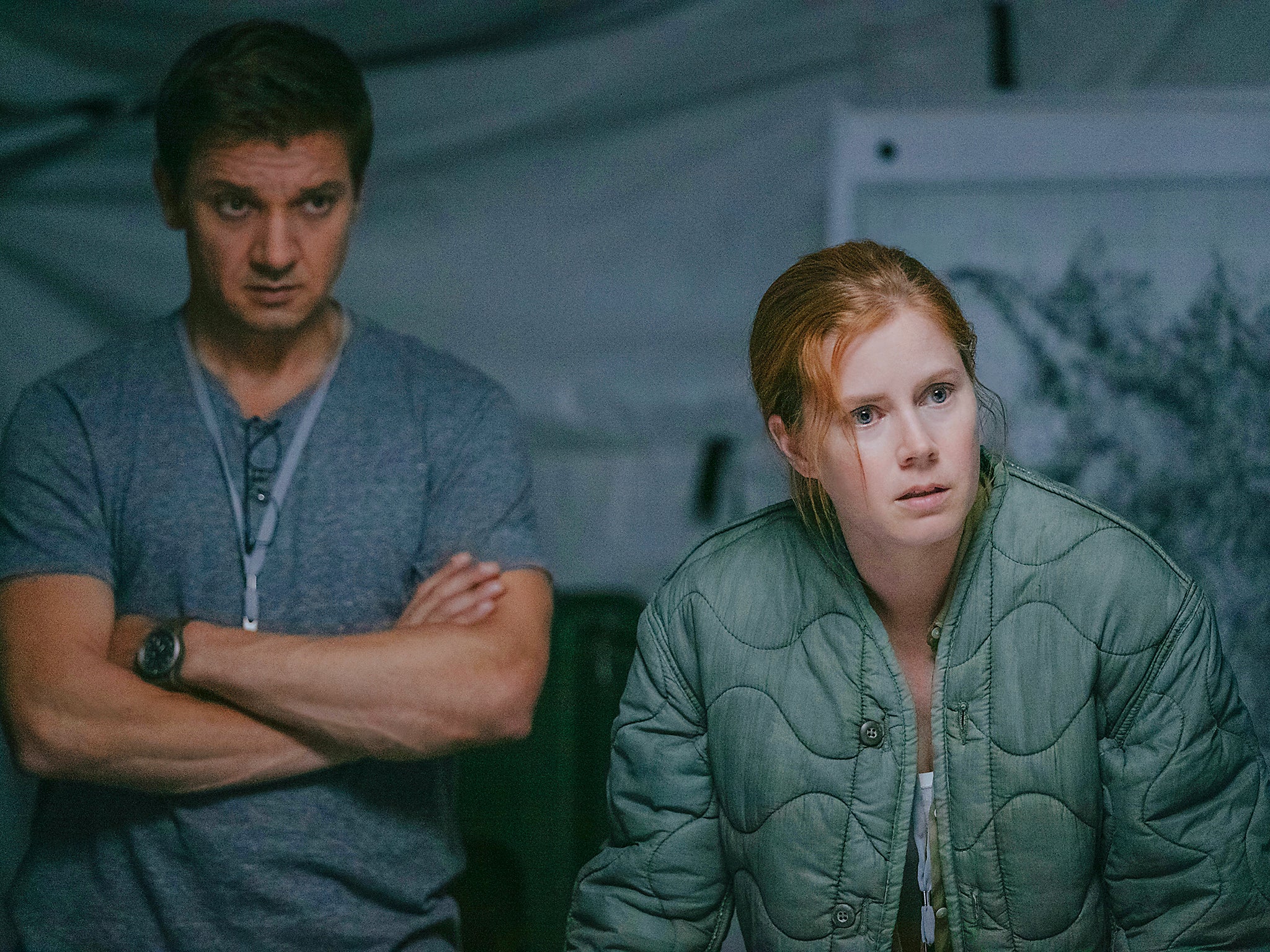 Jeremy Renner and Amy Adams make contact with extraterrestrials in an aliens' craft in 'Arrival'