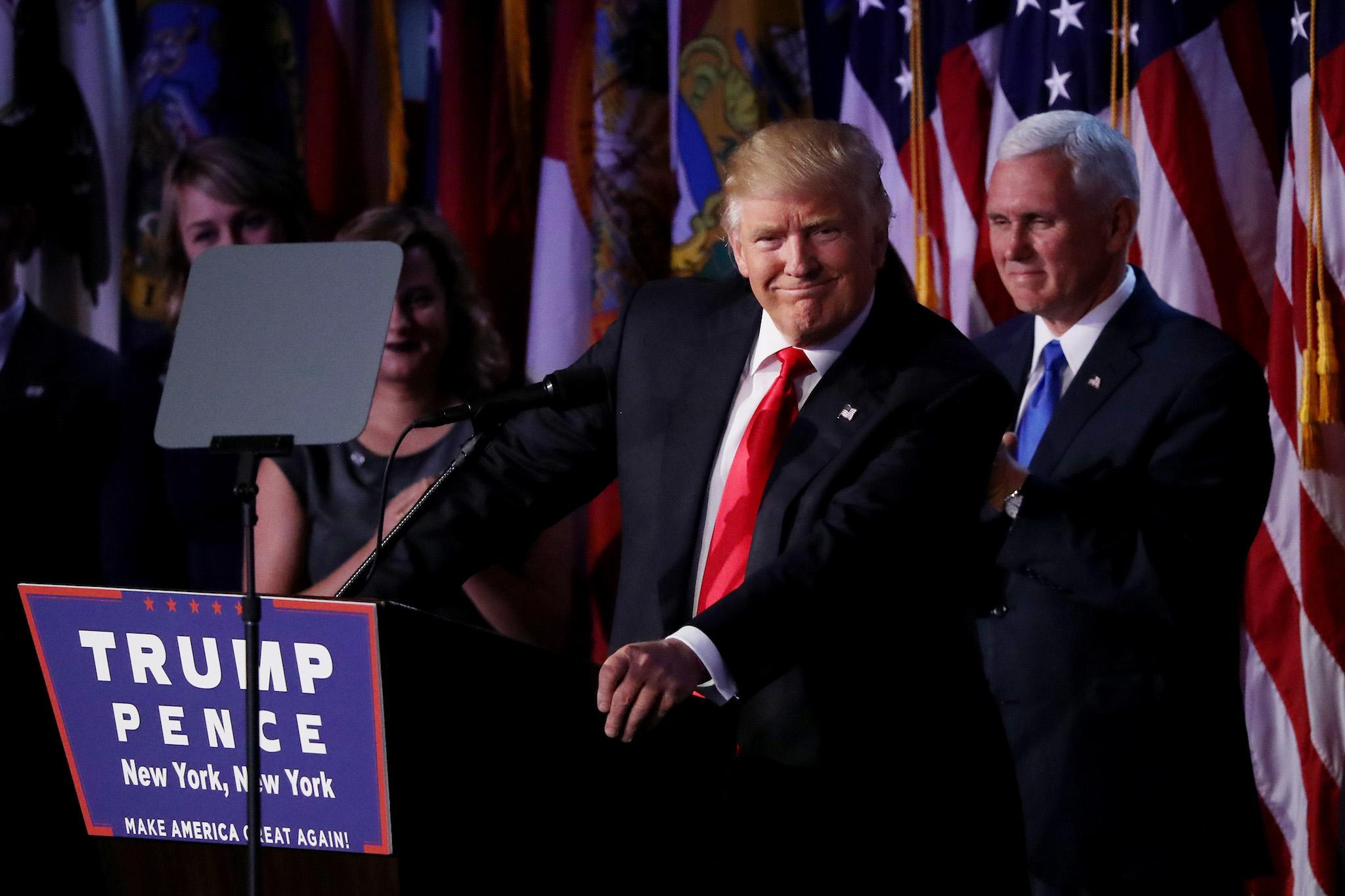 Republican president-elect Donald Trump delivers his acceptance speech during his election night event at the New York Hilton Midtown in the early morning hours of November 9, 2016 in New York City