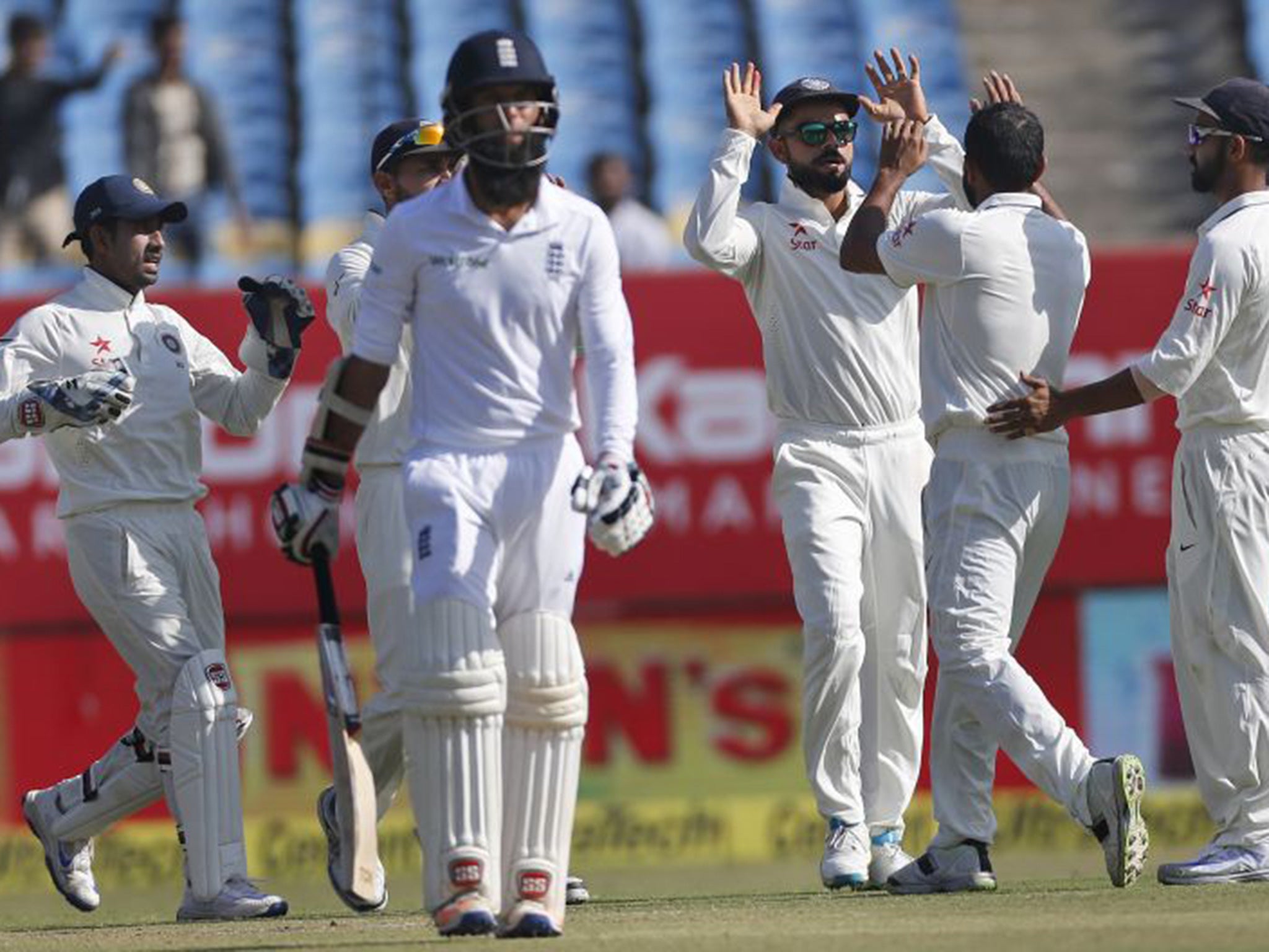 Moeen walks away from the crease having been dismissed for 117