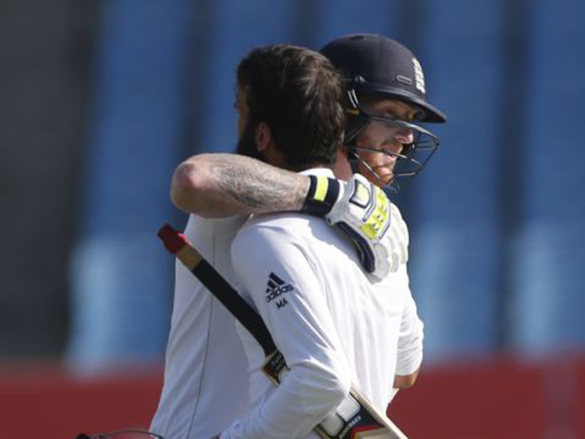 Stokes and Moeen embrace after the latter's century