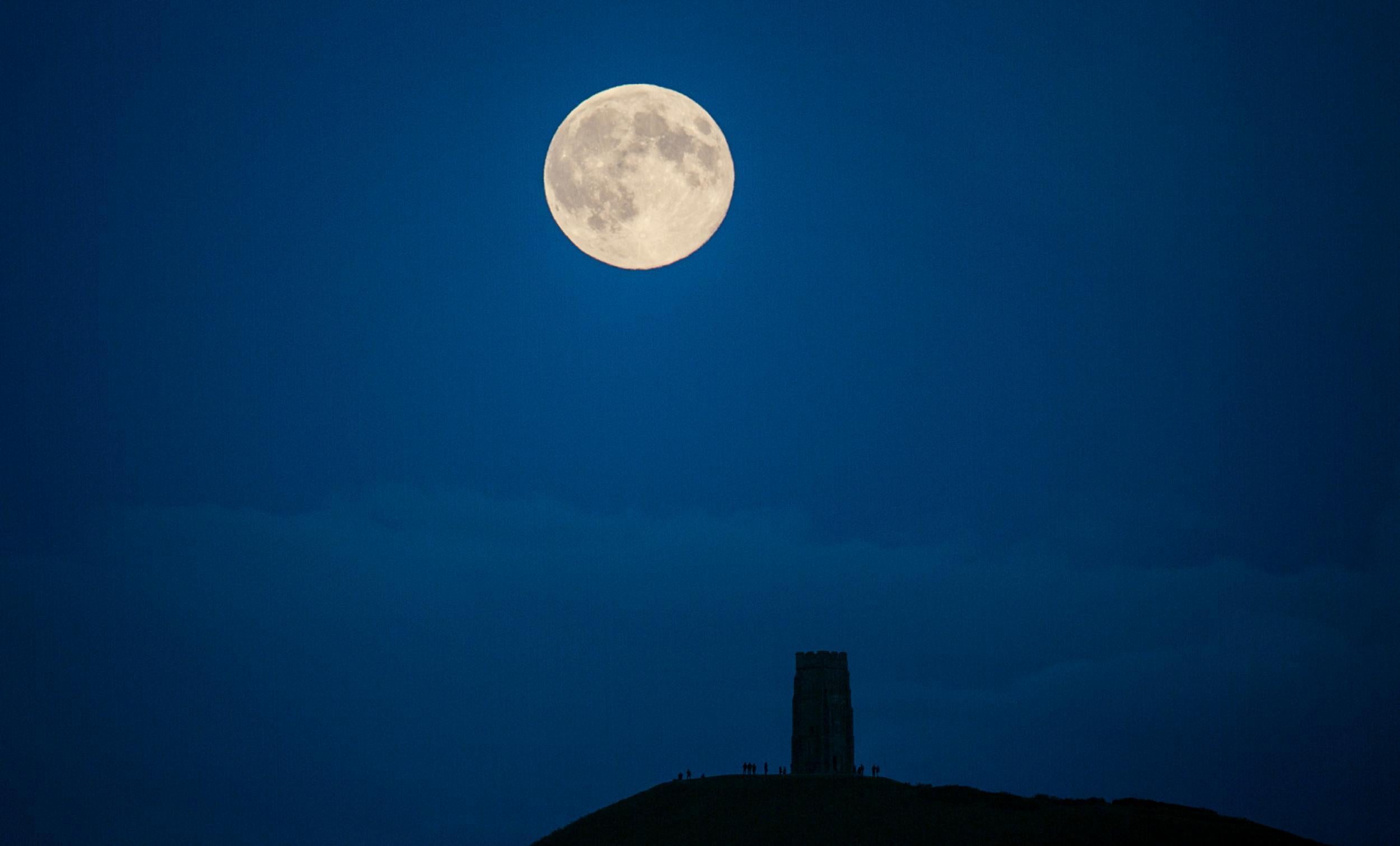 The supermoon over Glastonbury Tor