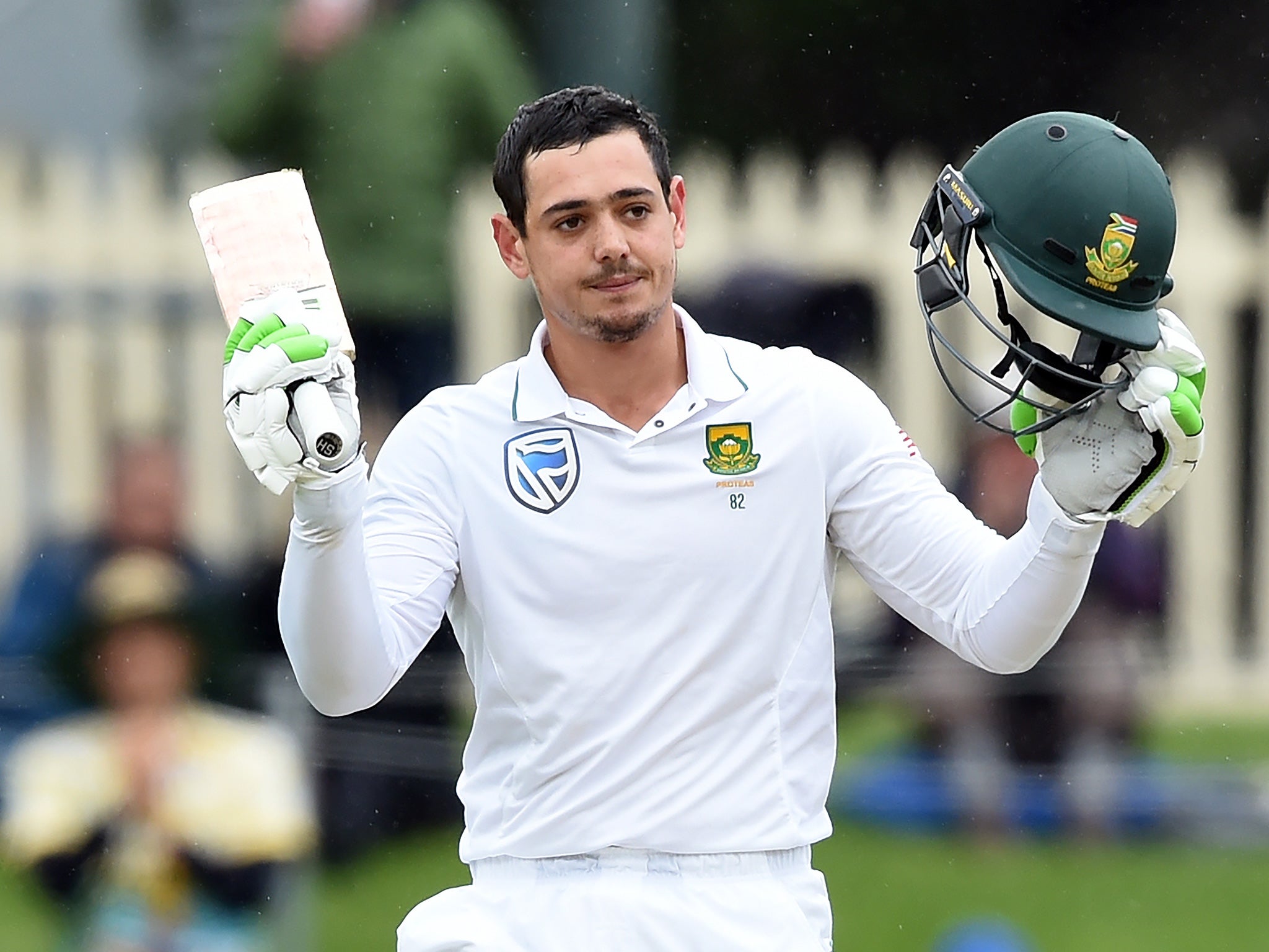 De Kock celebrates his 100-run haul in Hobart