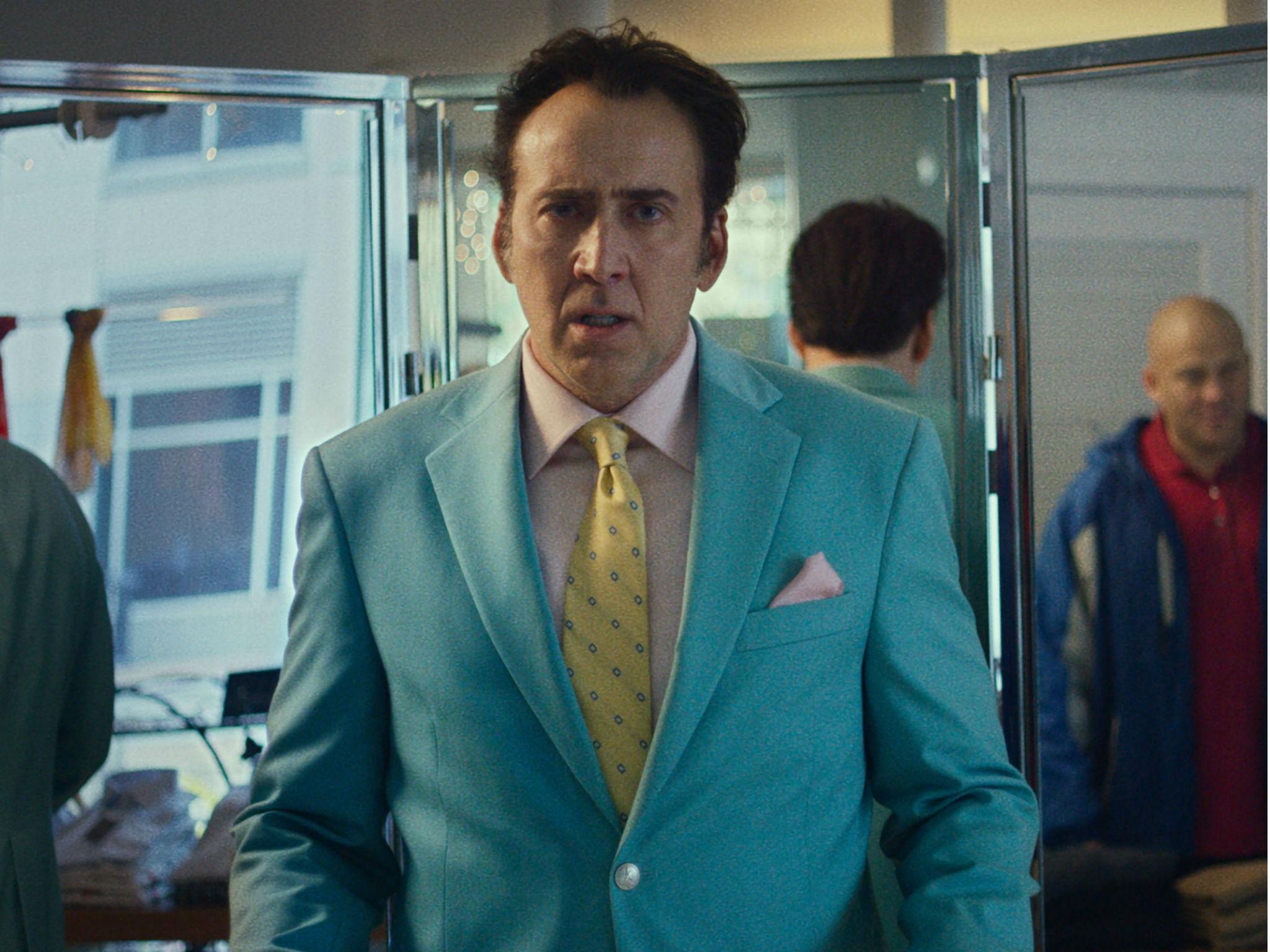 Cage and Christopher Matthew Cook in a scene from 'Dog Eat Dog'