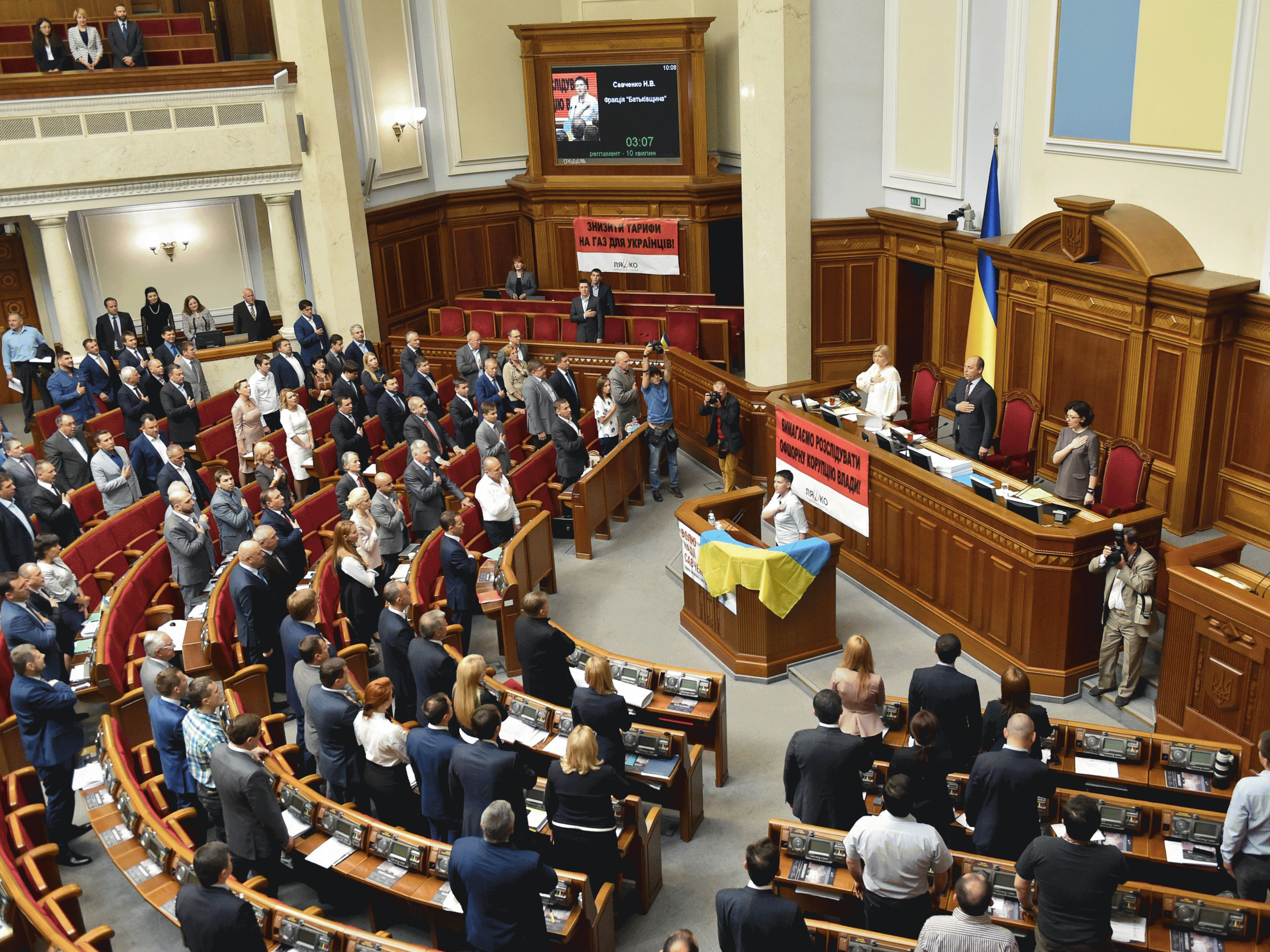 MPs singing the national anthem in the Ukraine parliament Getty