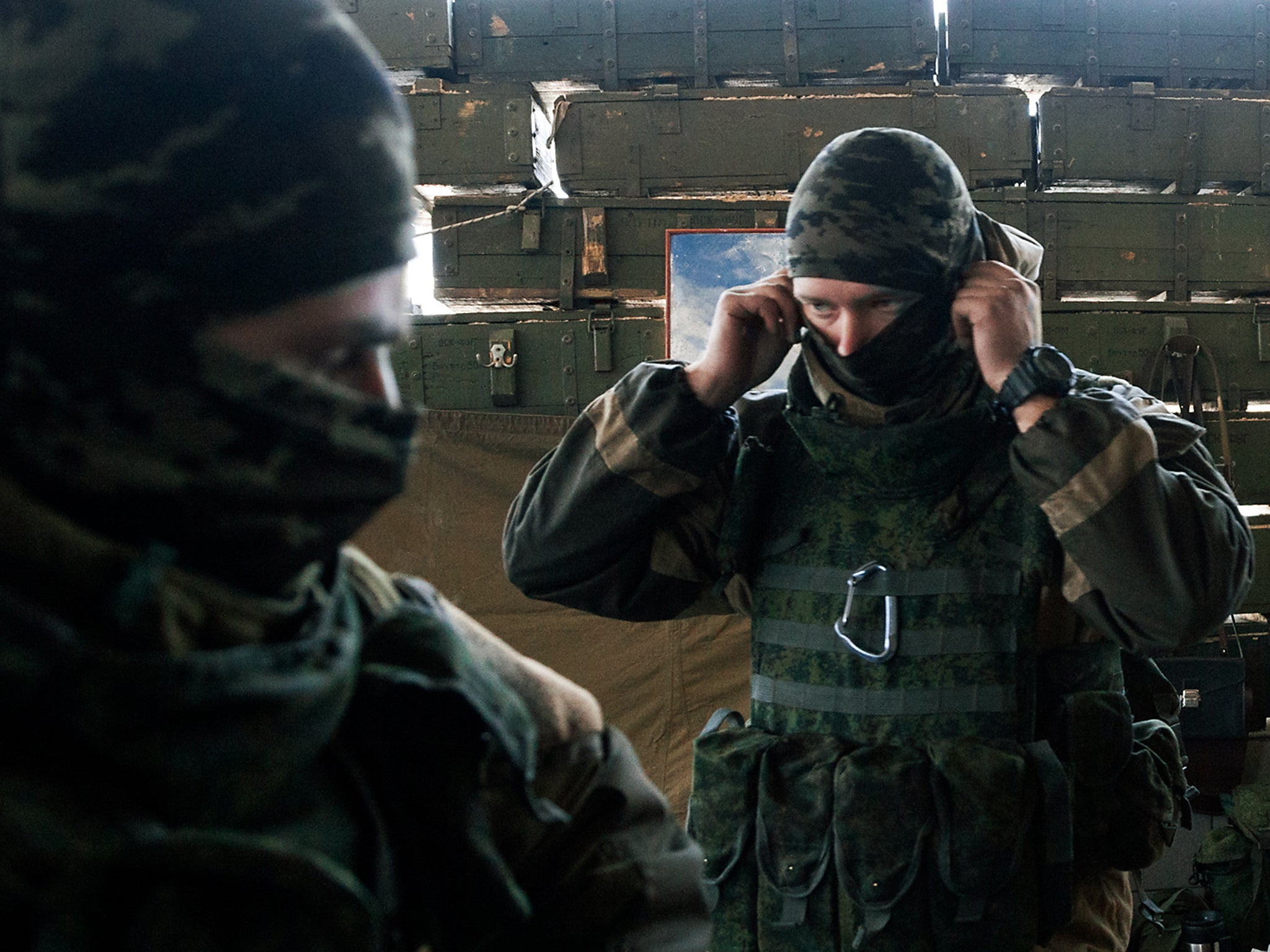 A soldier gets ready for a routine check on the first and second floor of the terminal