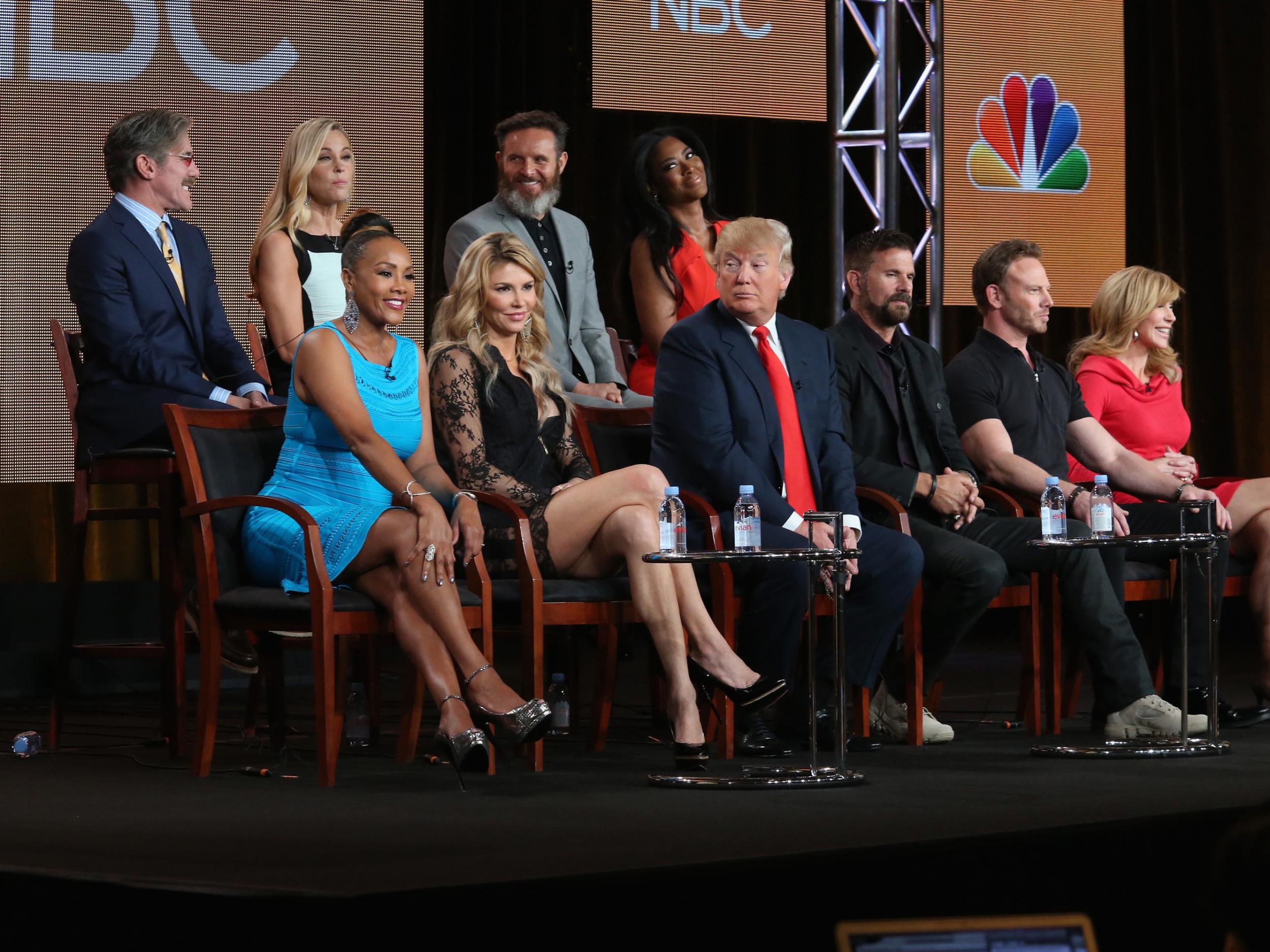 The Celebrity Apprentice executive producer Mark Burnett sits directly behind Donald Trump during a panel discussion