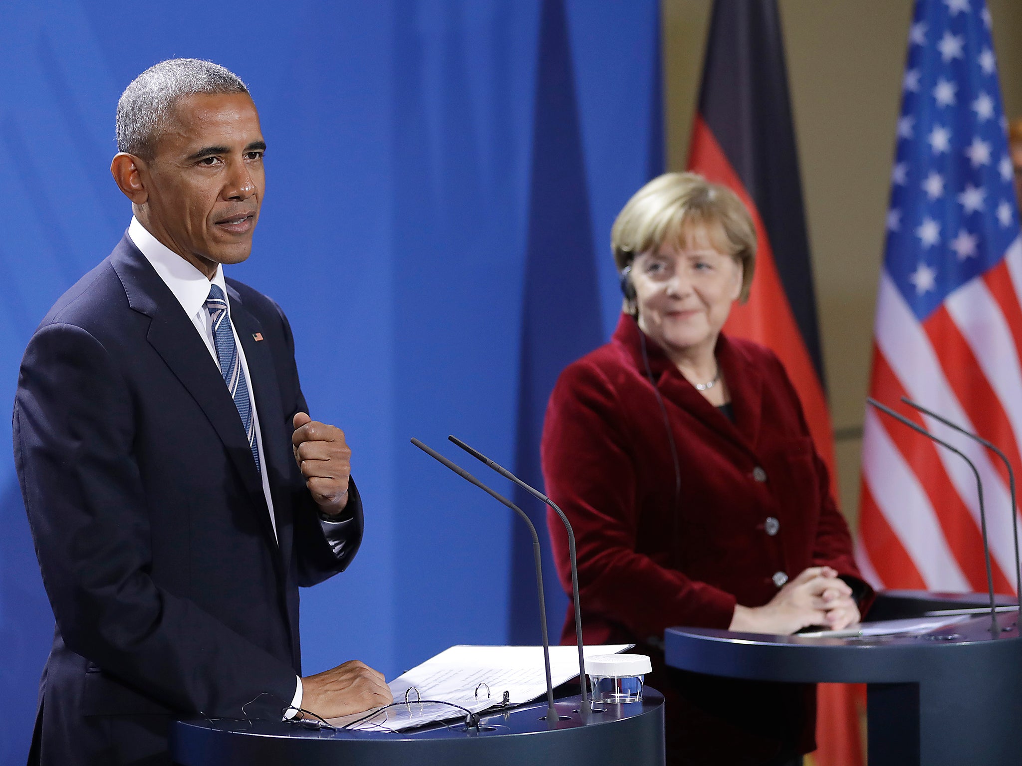 Mr Obama praised Ms Merkel as an 'outstanding partner' at their Berlin press conference, suggesting he would vote for her if he were German