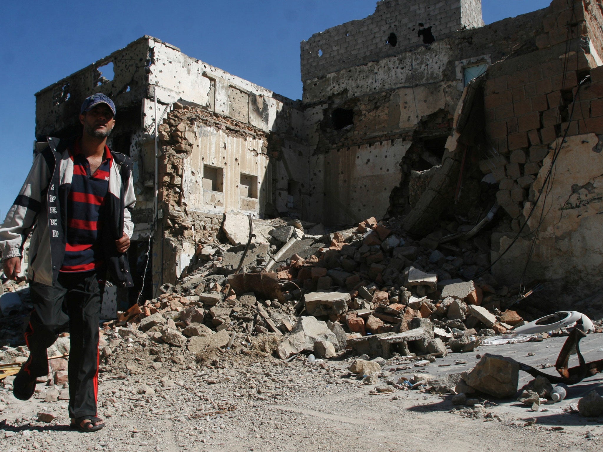 The damage to a residential area in Taiz where rebels and pro-government forces have been fighting