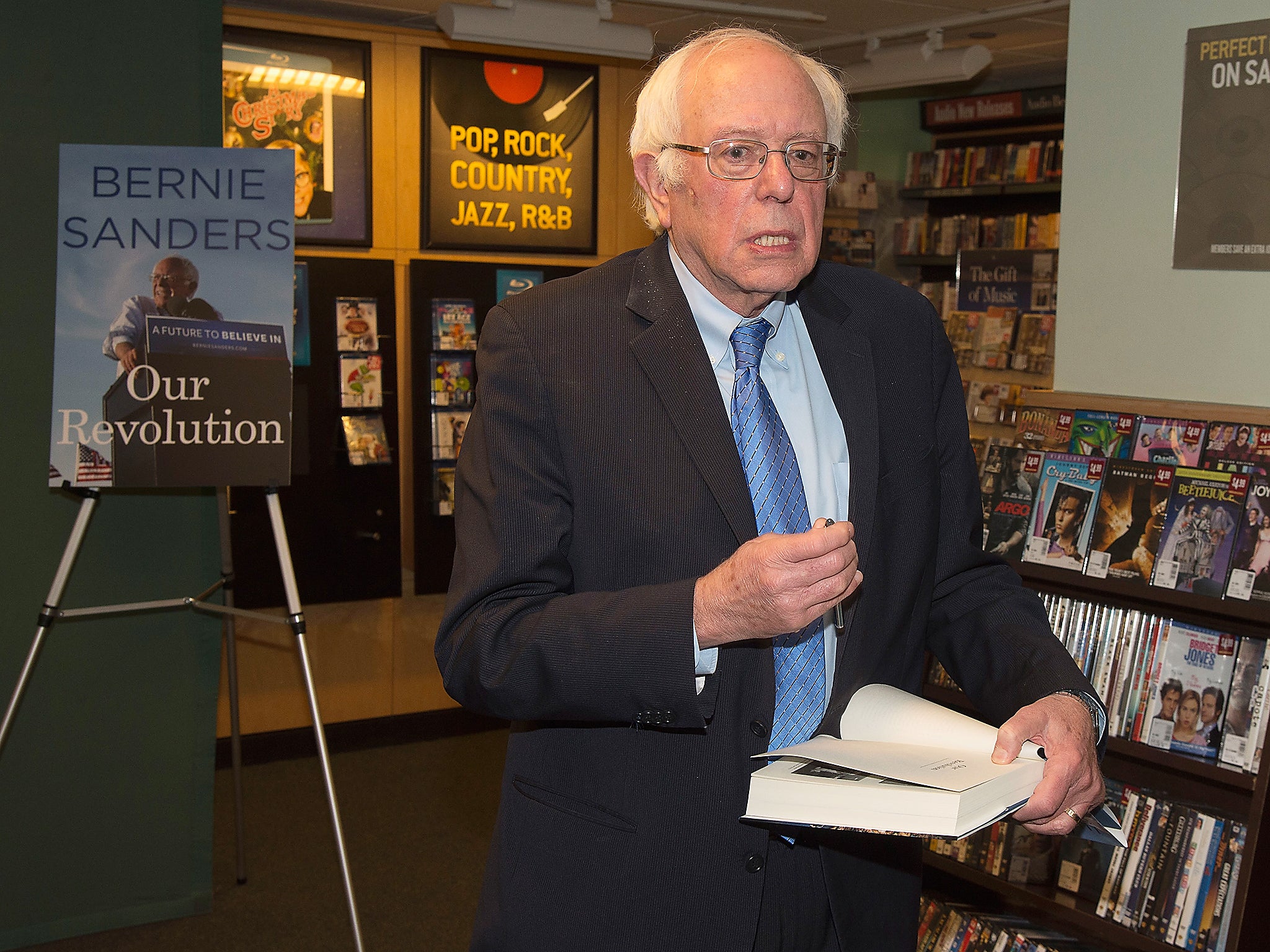 Bernie Sanders signs copies of his book 'Our Revolution: A Future To Believe In' at a bookshop in New York