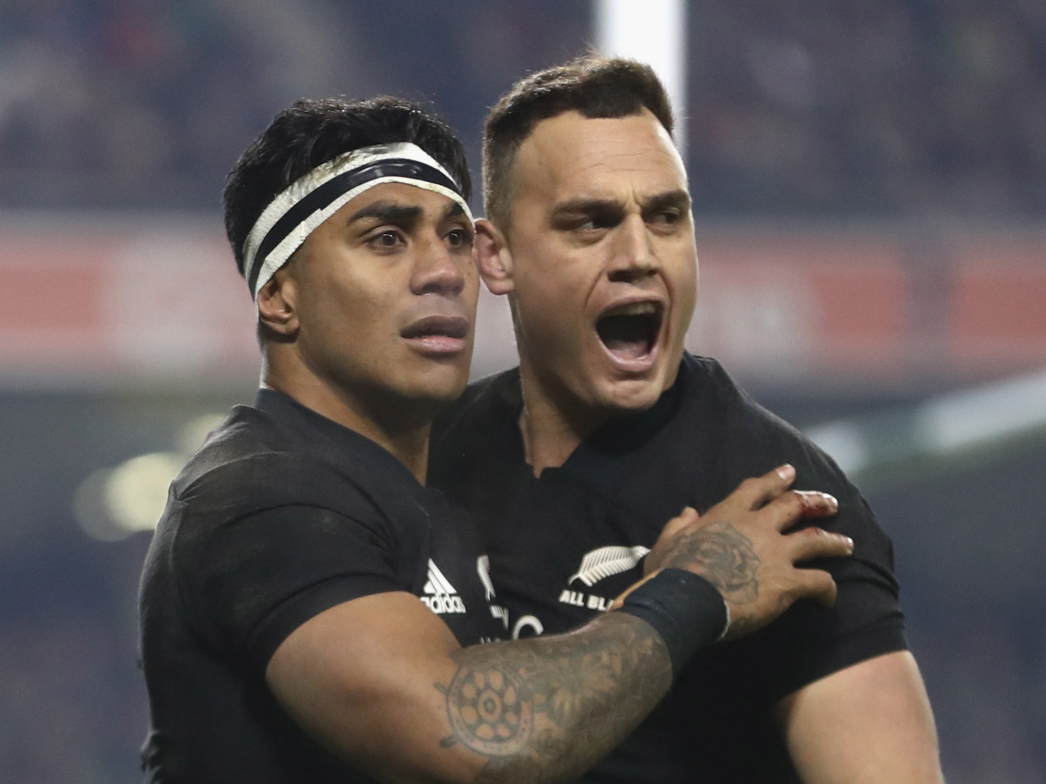 Fekitoa celebrates his try with team-mate Dagg