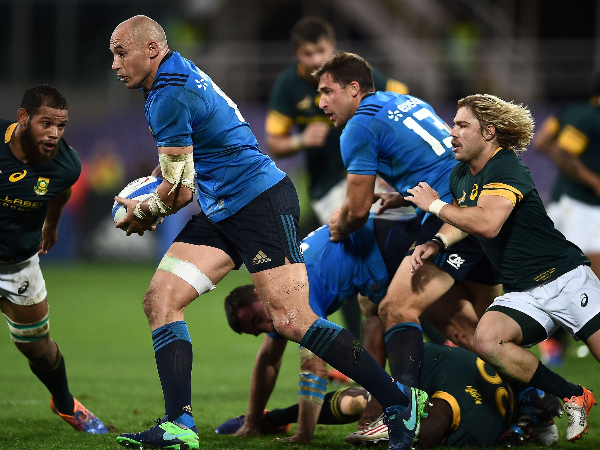 Sergio Parisse escapes with the ball to lead an Italian charge