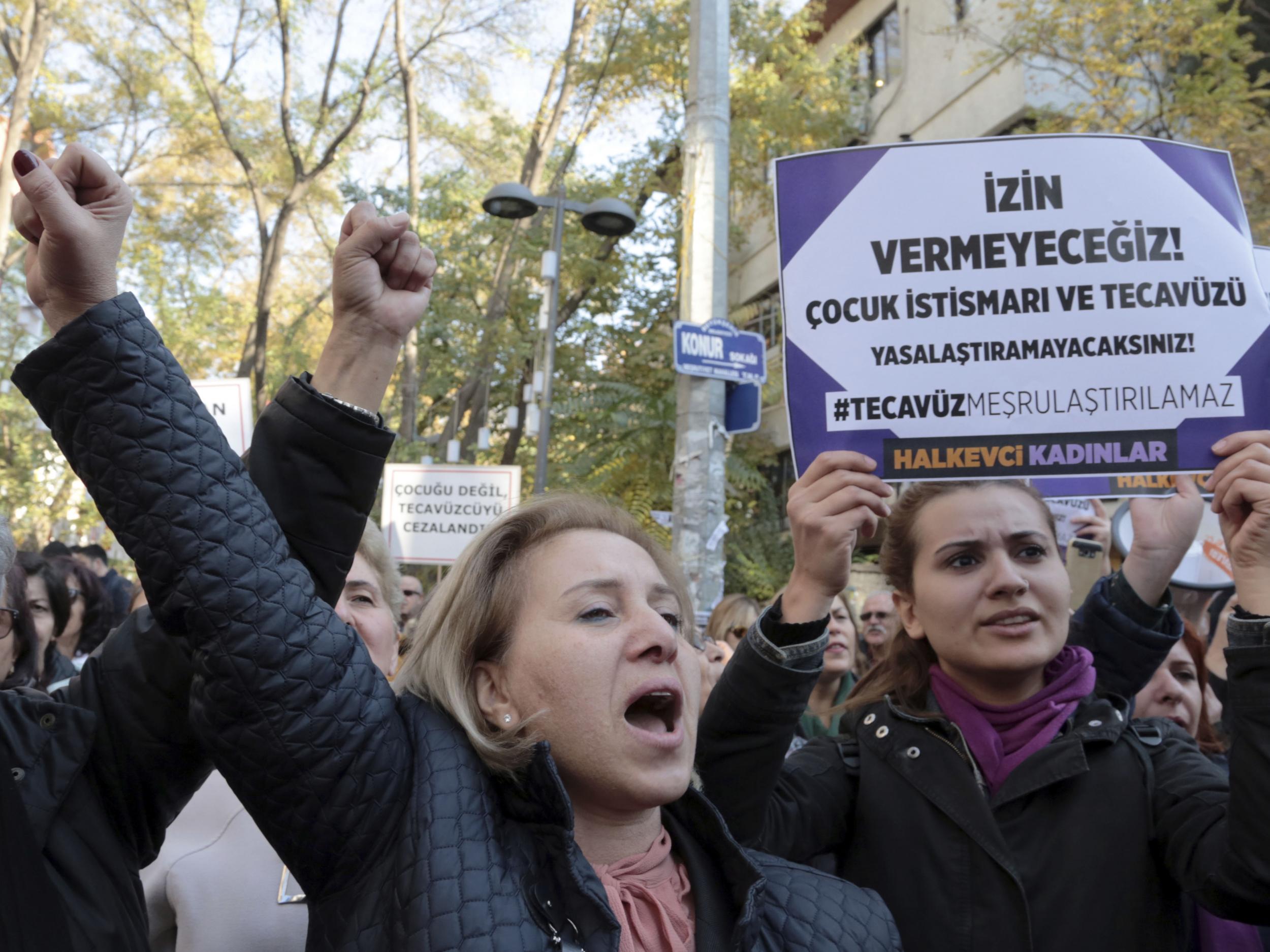 Women gathered in Ankara holding signs saying: “We will not let you. Rape cannot be legalised'